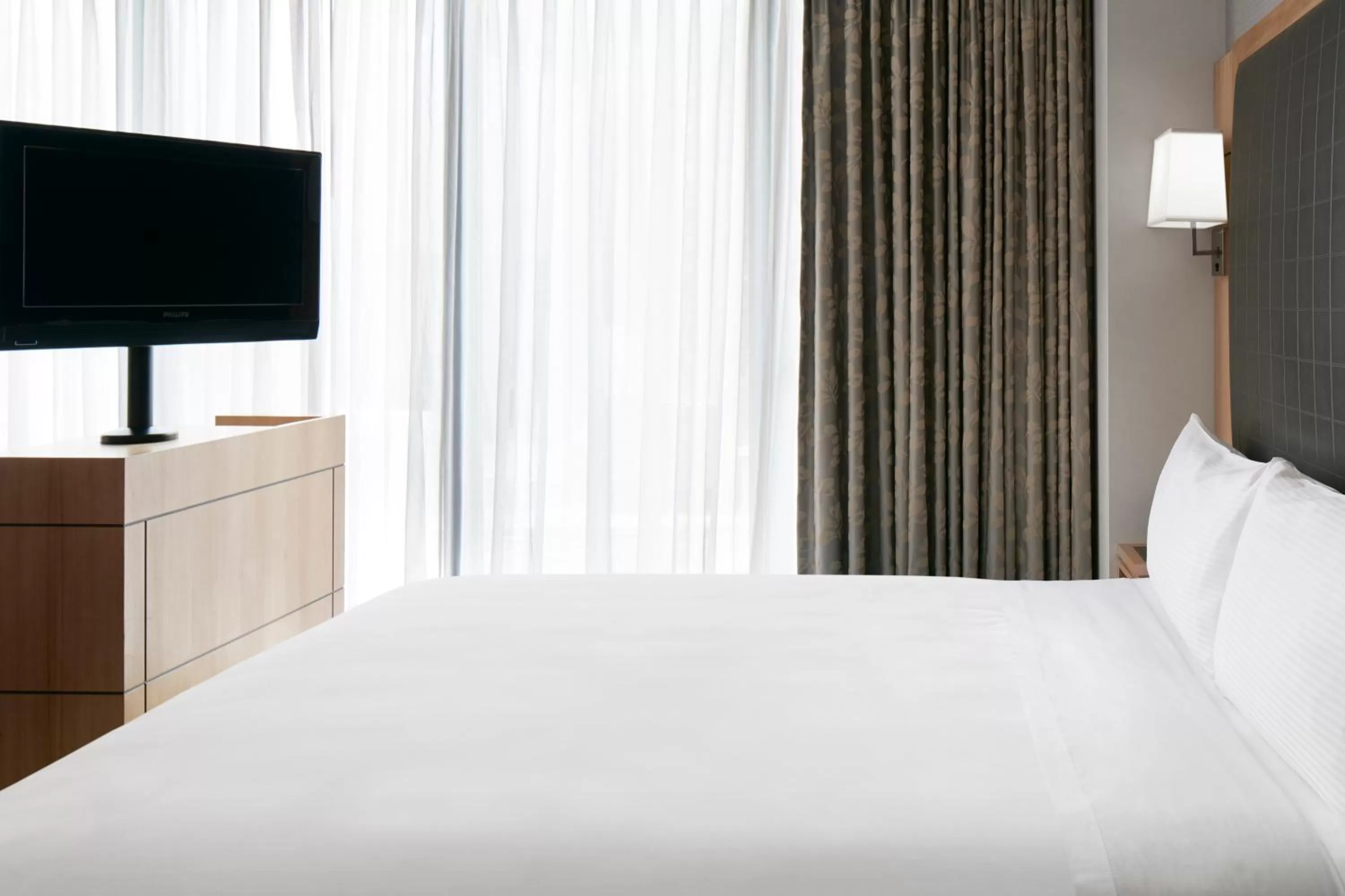 Bed in Club Quarters Hotel World Trade Center, New York