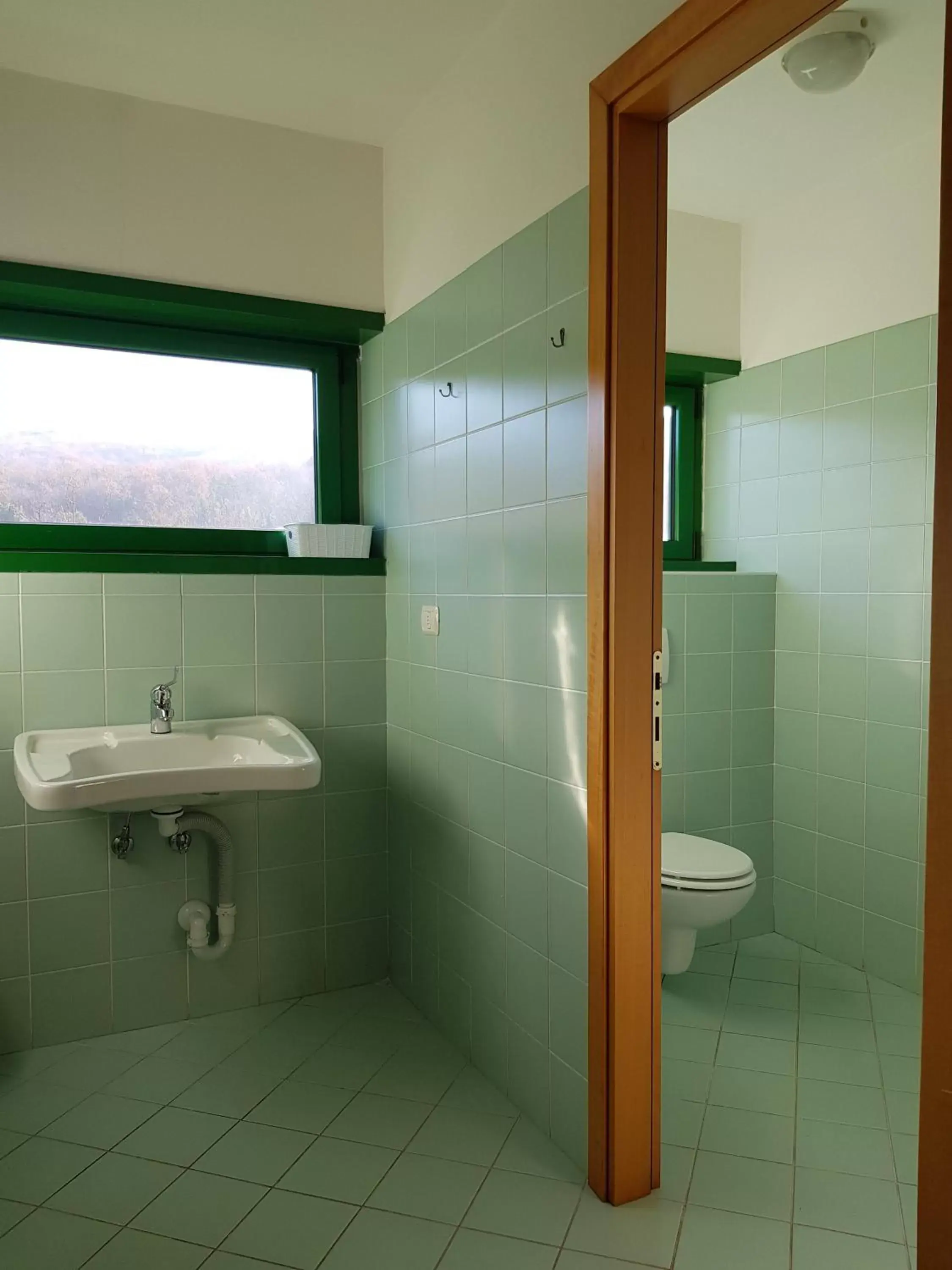 Toilet, Bathroom in Hotel Oasi