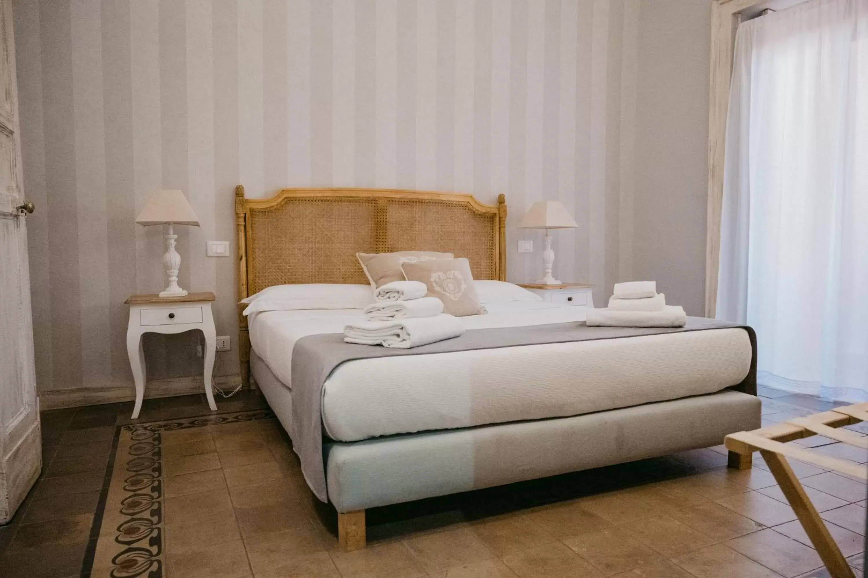 Bed in La Casa di Alma Luxury rooms