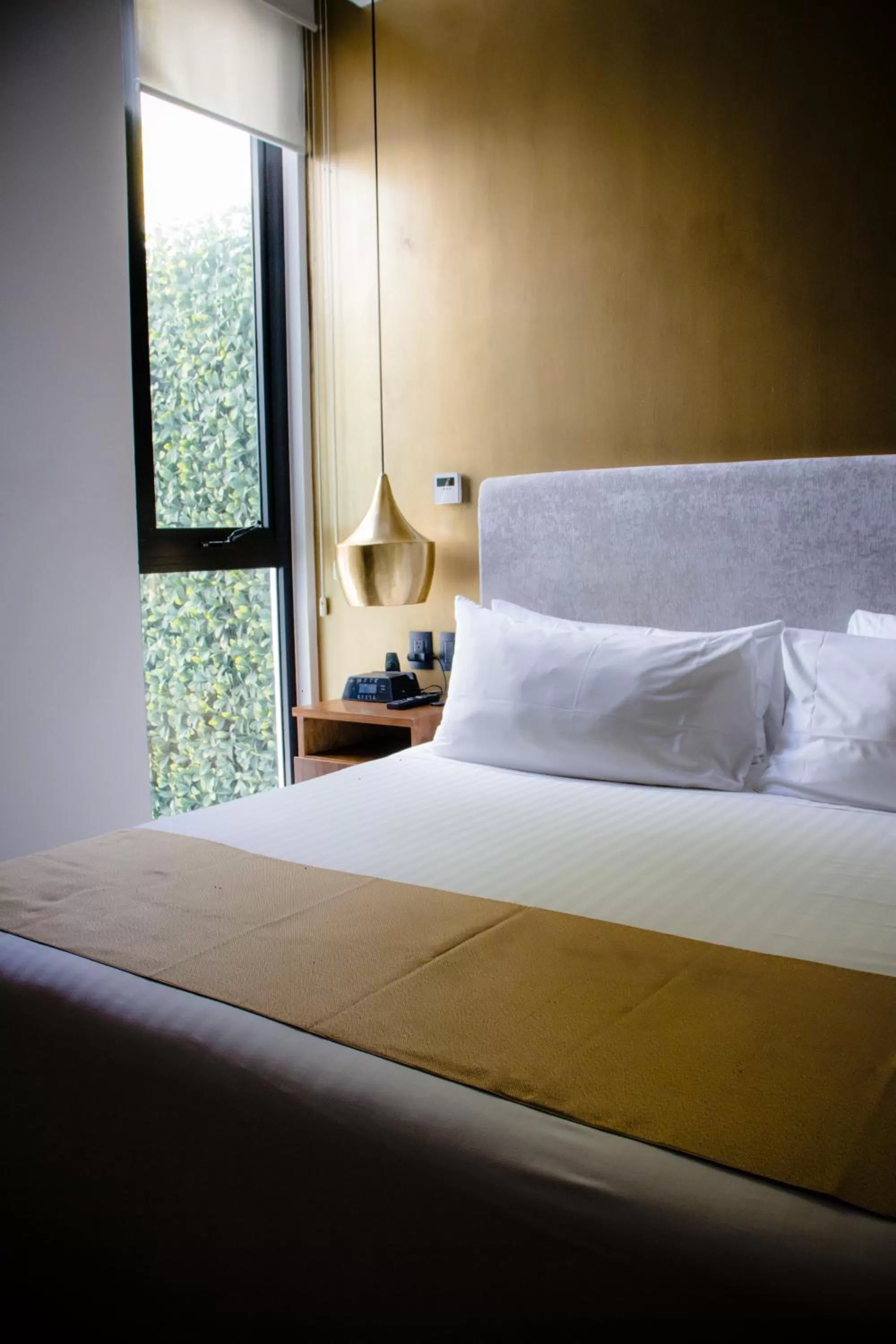 Bed in IT Boutique Hotel & Restaurant