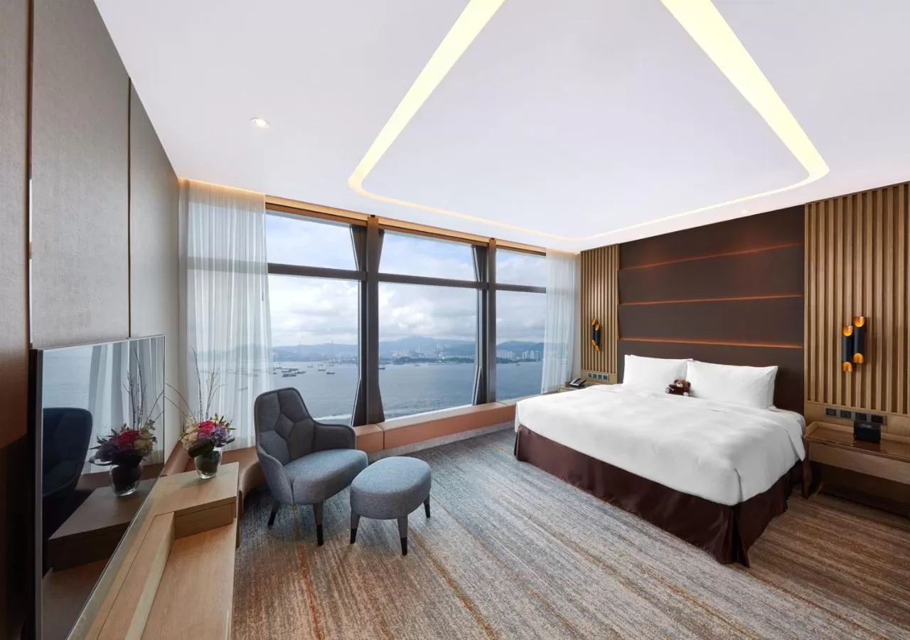 Seating area, Bed in Oasis Aurum 181 Hotel