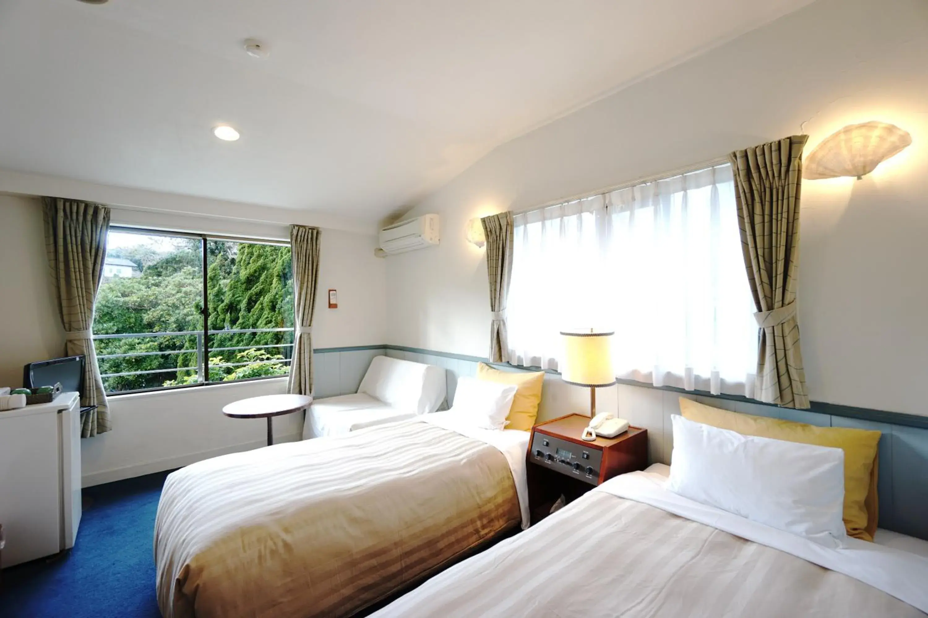 Bed in Gardenvilla Shirahama Bed in Gardenvilla Shirahama