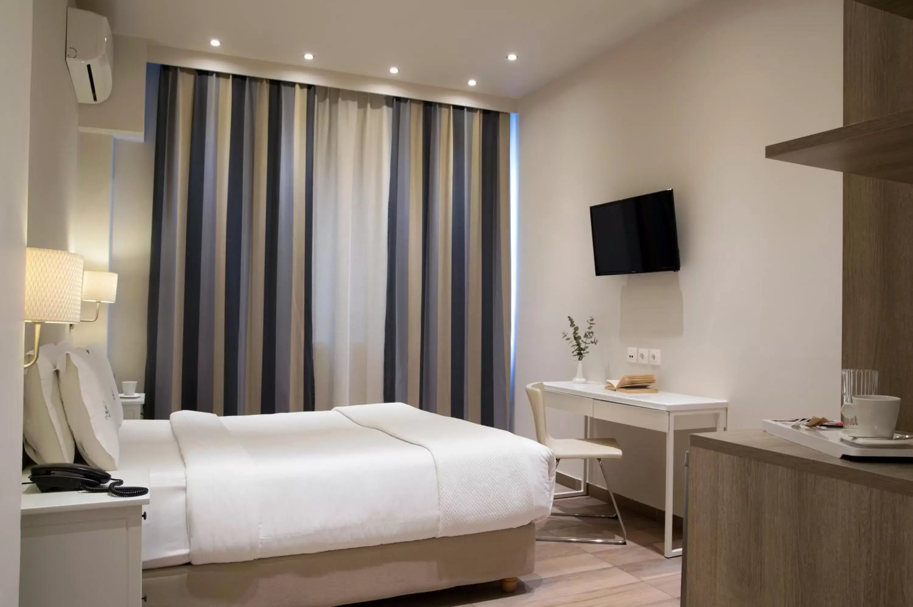 Bed in Piraeus City Hotel