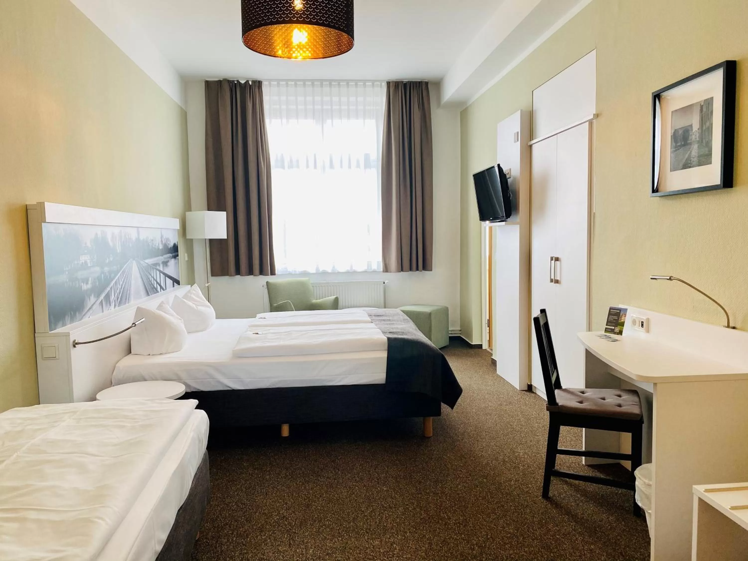 Photo of the whole room, Bed in Hotel am Schlosspark