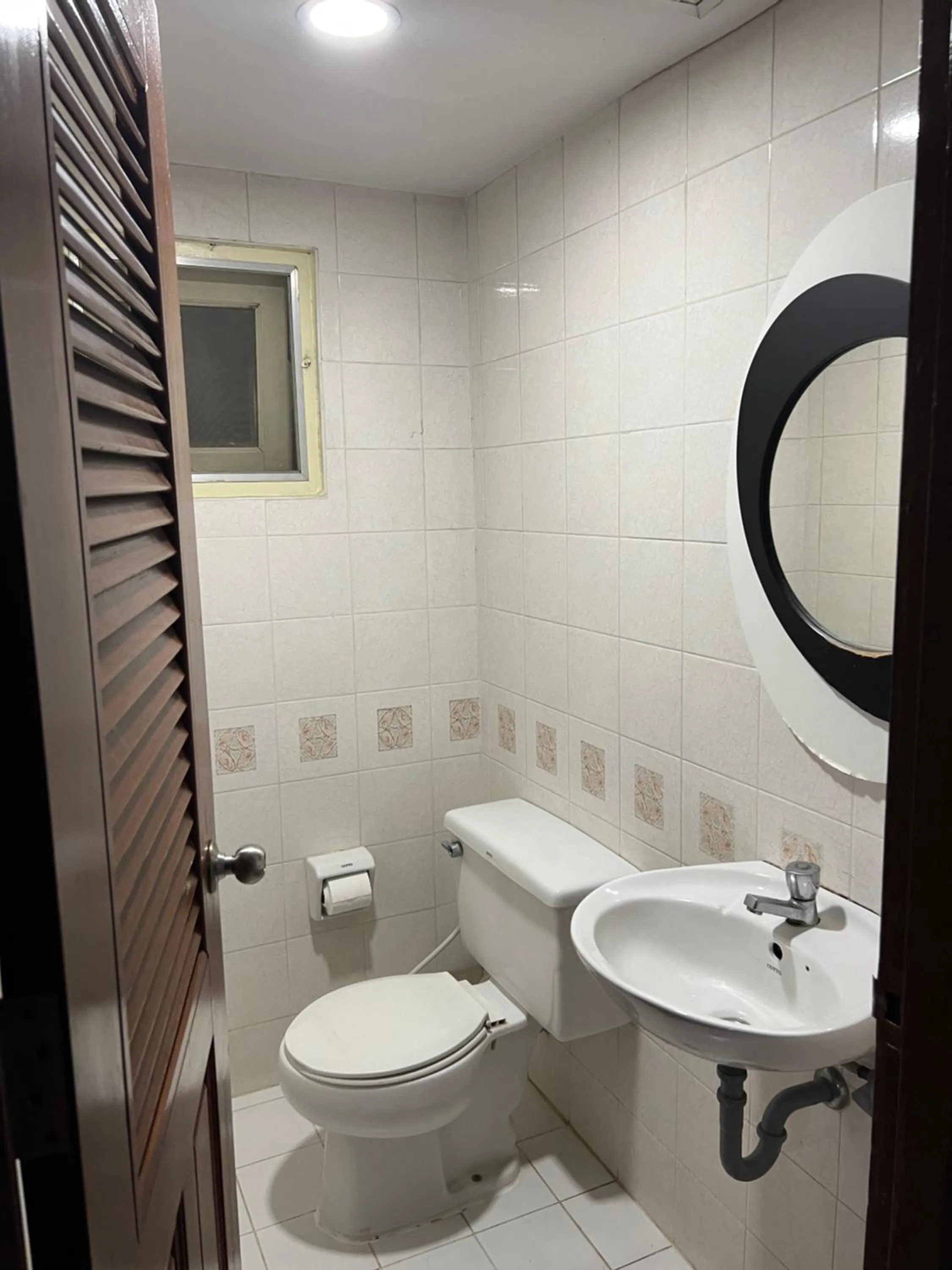 Toilet in Mall Suites Hotel