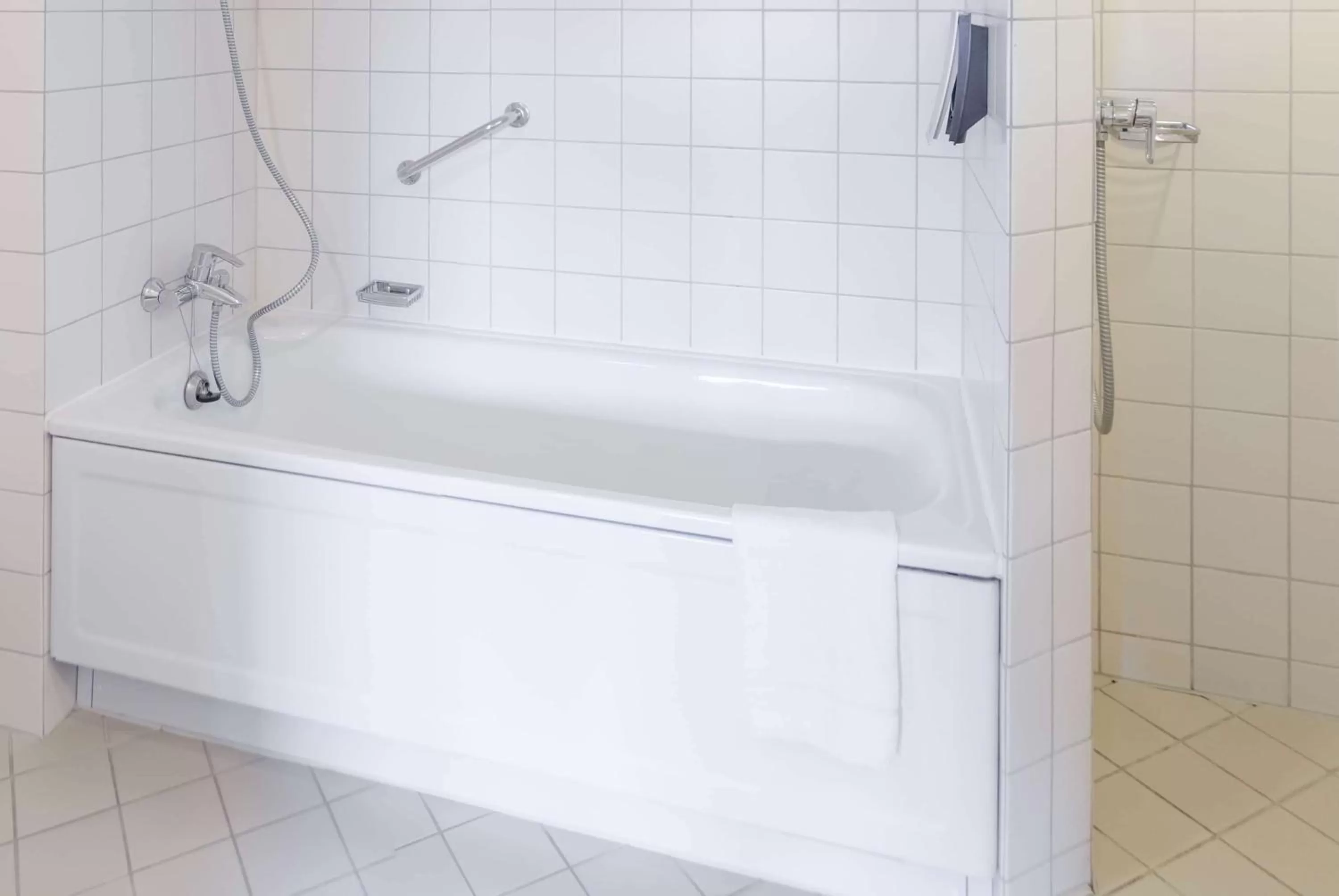 Bathroom in Ramada by Wyndham Flensburg City