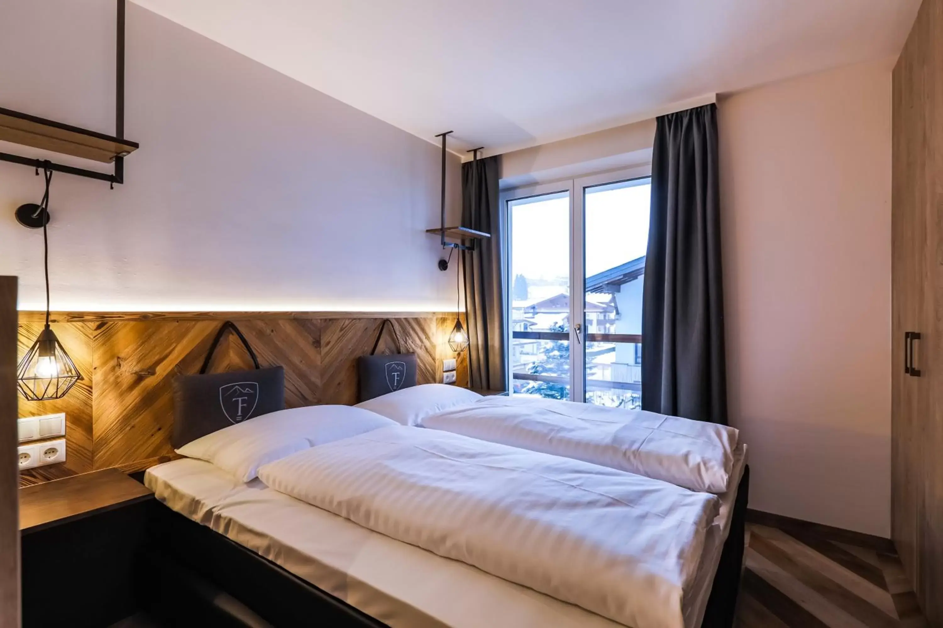 Bedroom, Bed in 24 by AvenidA Hotel & Residences Kaprun