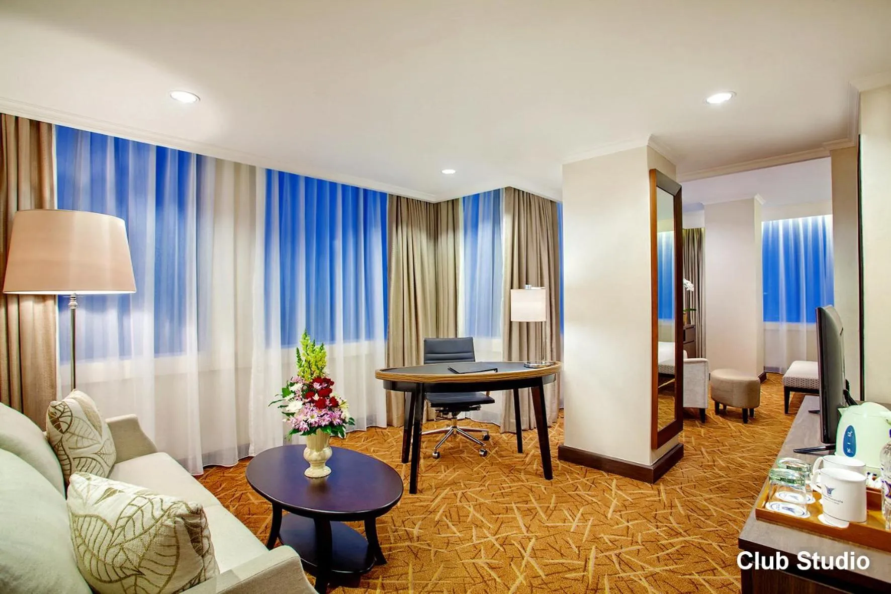 Living room, Bed in Menara Peninsula Hotel