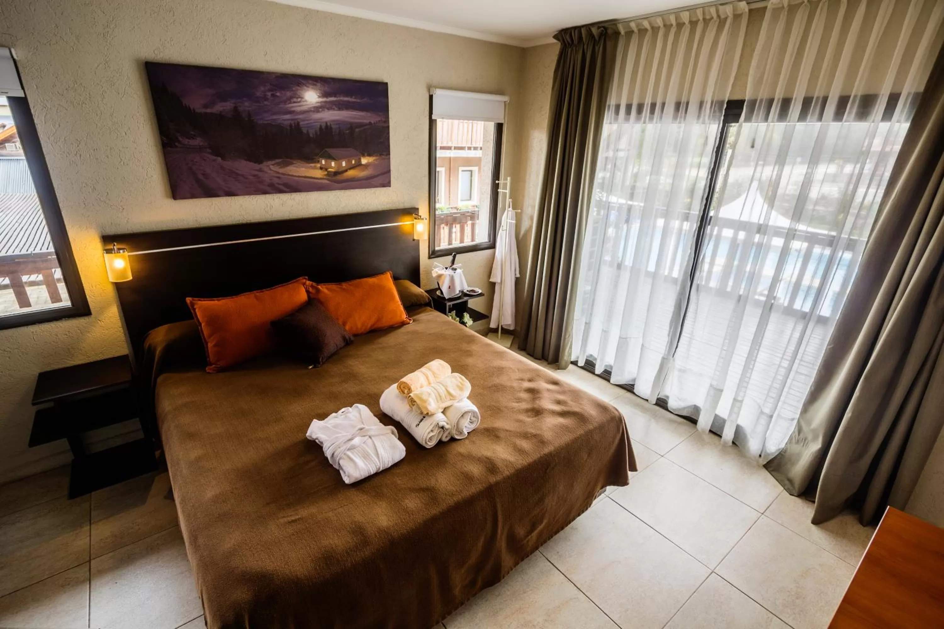 Bed in BlackStone Apart Boutique Hotel