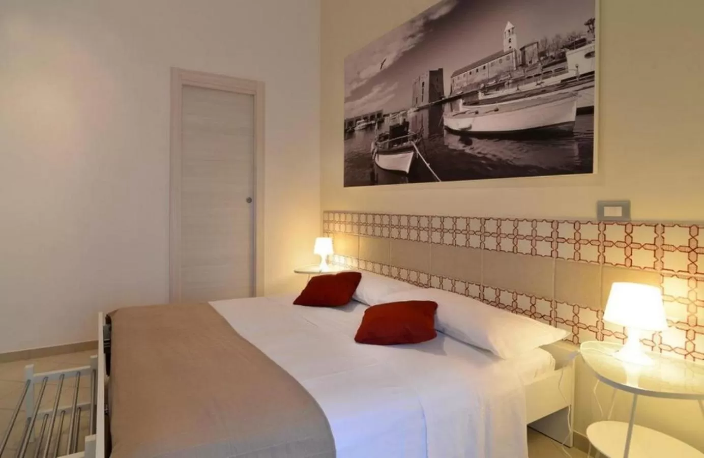 Bed in Santi e Saraceni Rooms