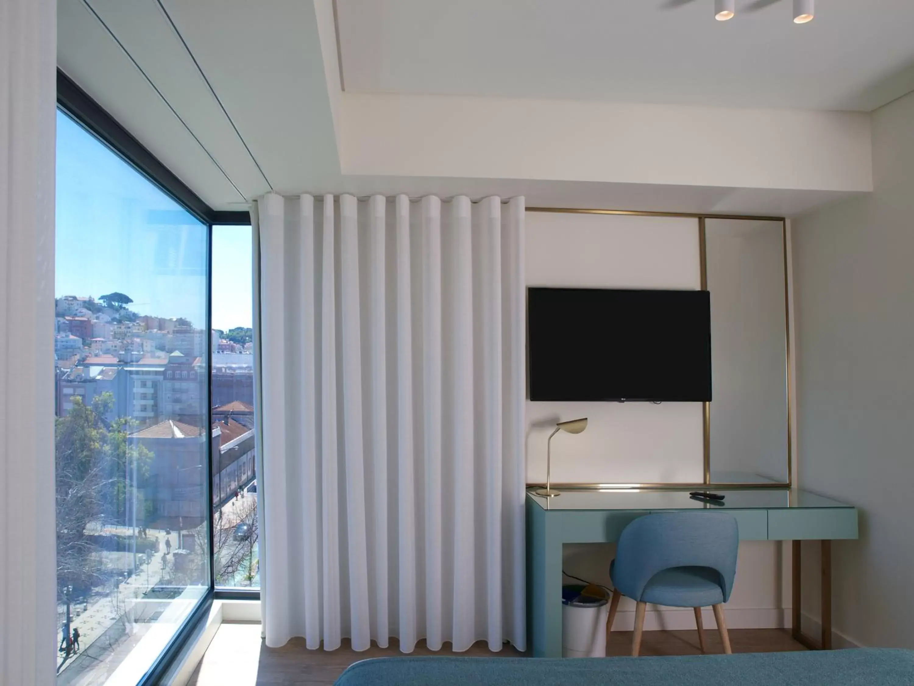Bedroom, TV/Entertainment Center in New Style Lisbon Hotel