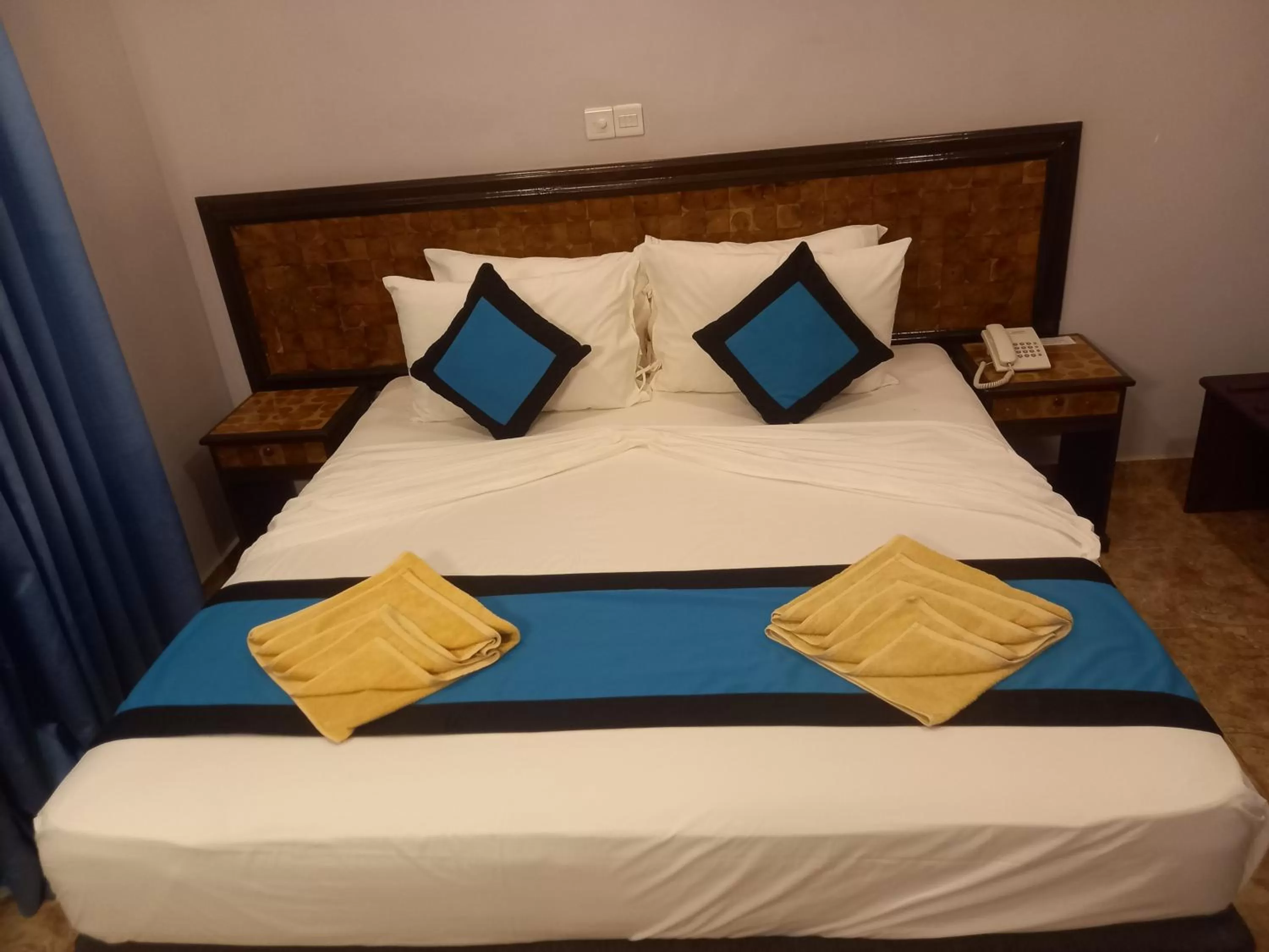 Bed in Blue Sand Beach Resort