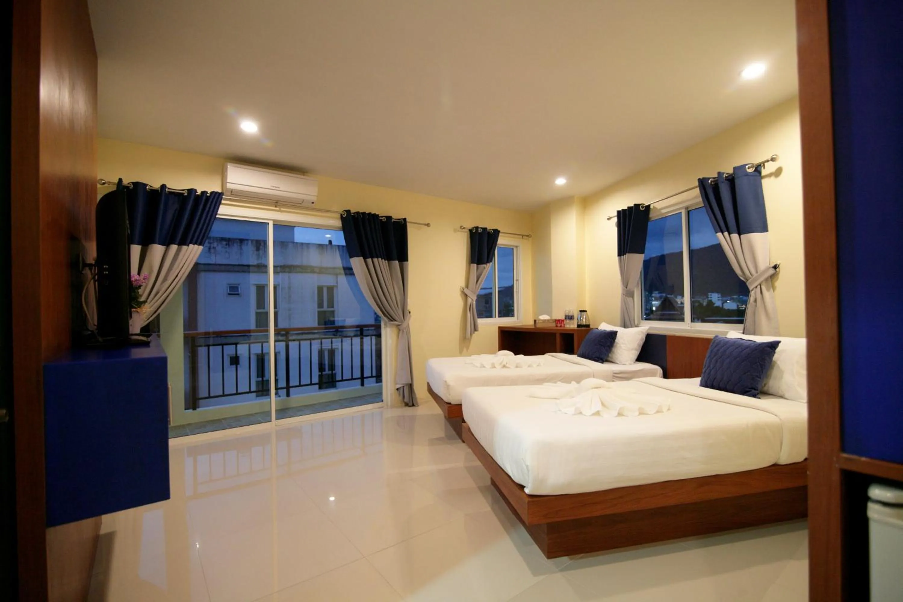 Bed in Calypso Patong Hotel