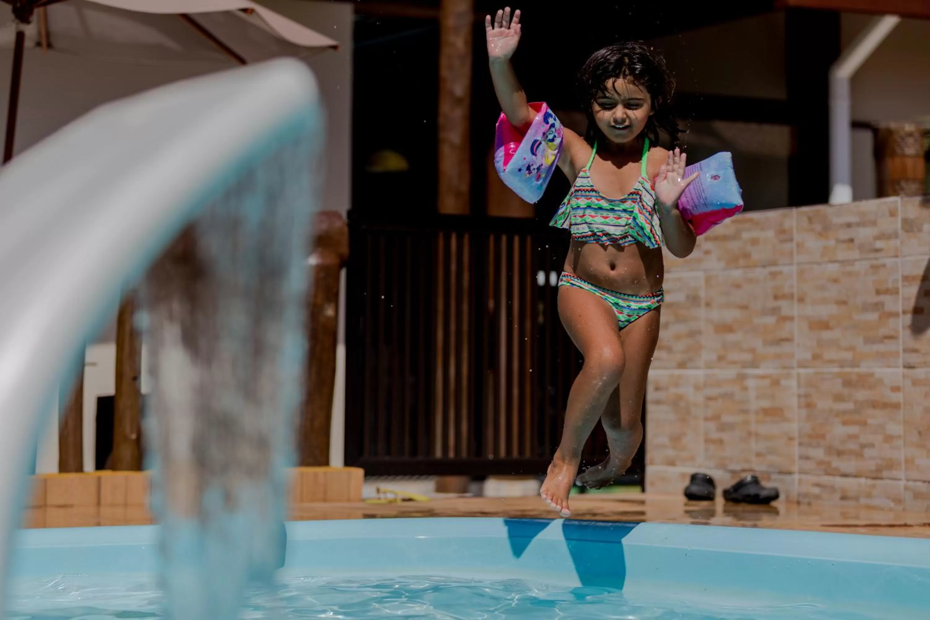 Swimming pool in Pousada Chalés do Julião