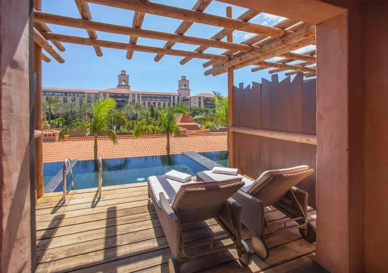 Balcony/Terrace, Swimming Pool in Lopesan Baobab Resort