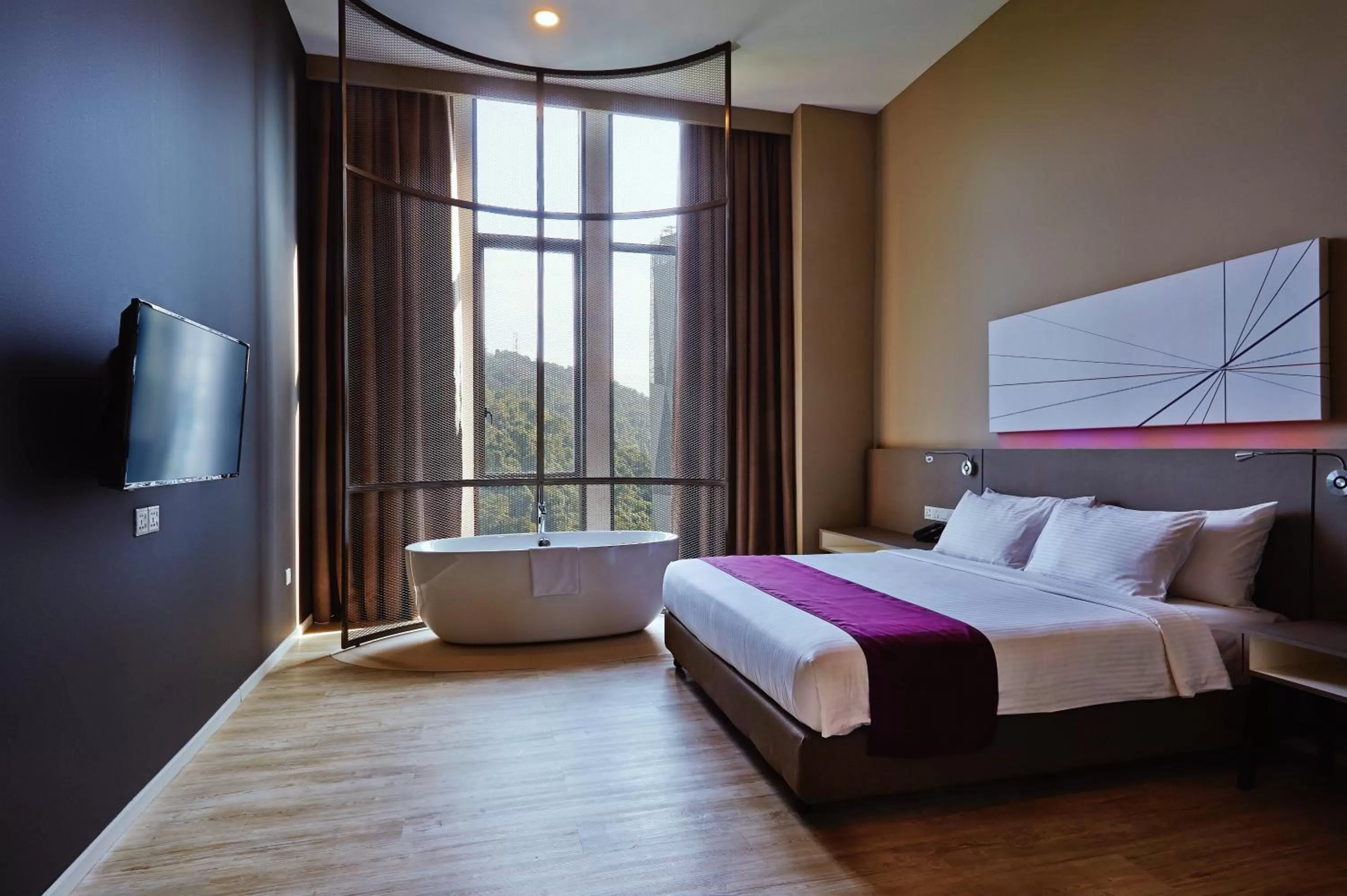 Bed in Qliq Damansara Hotel