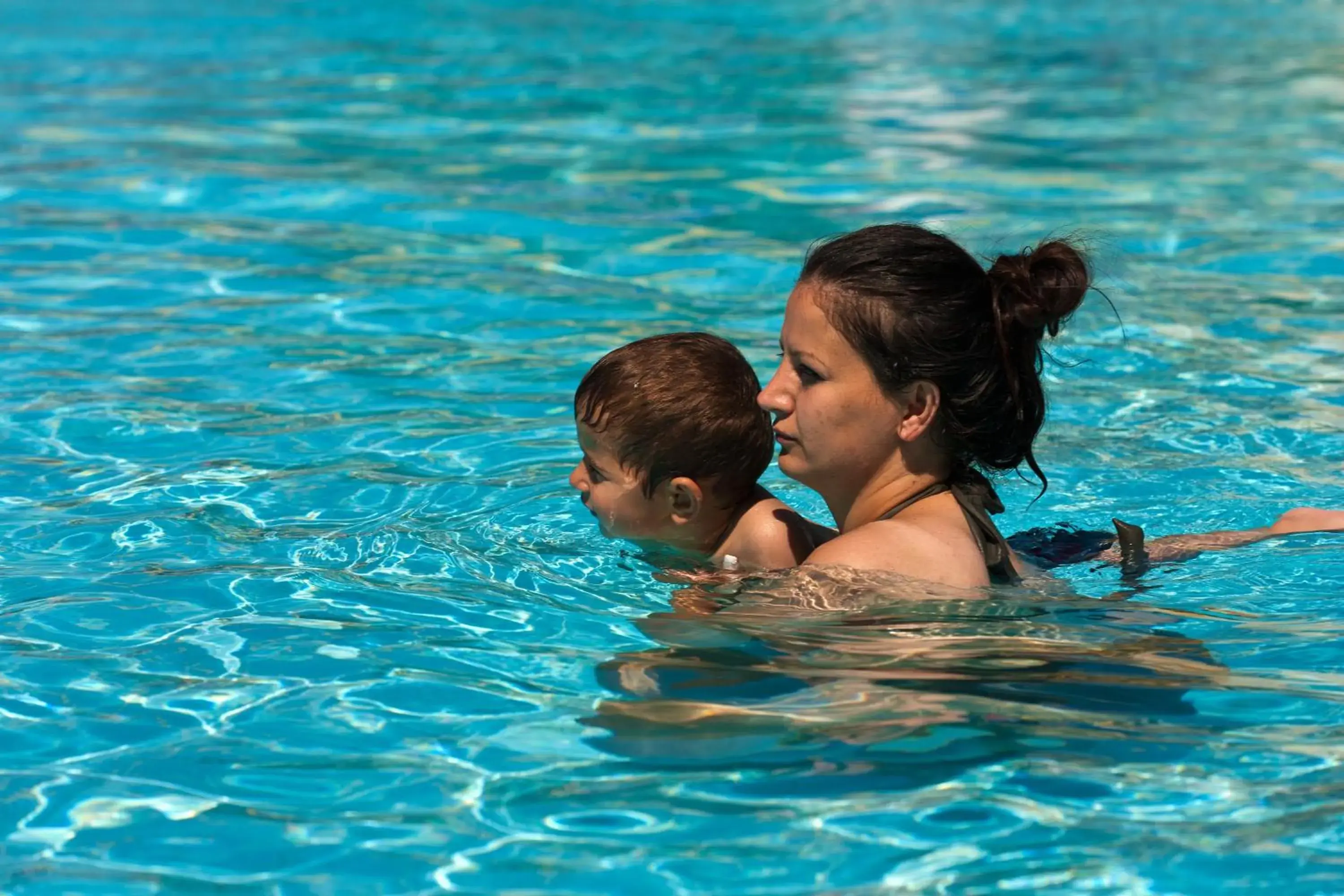 People, Swimming Pool in Blue Horizon