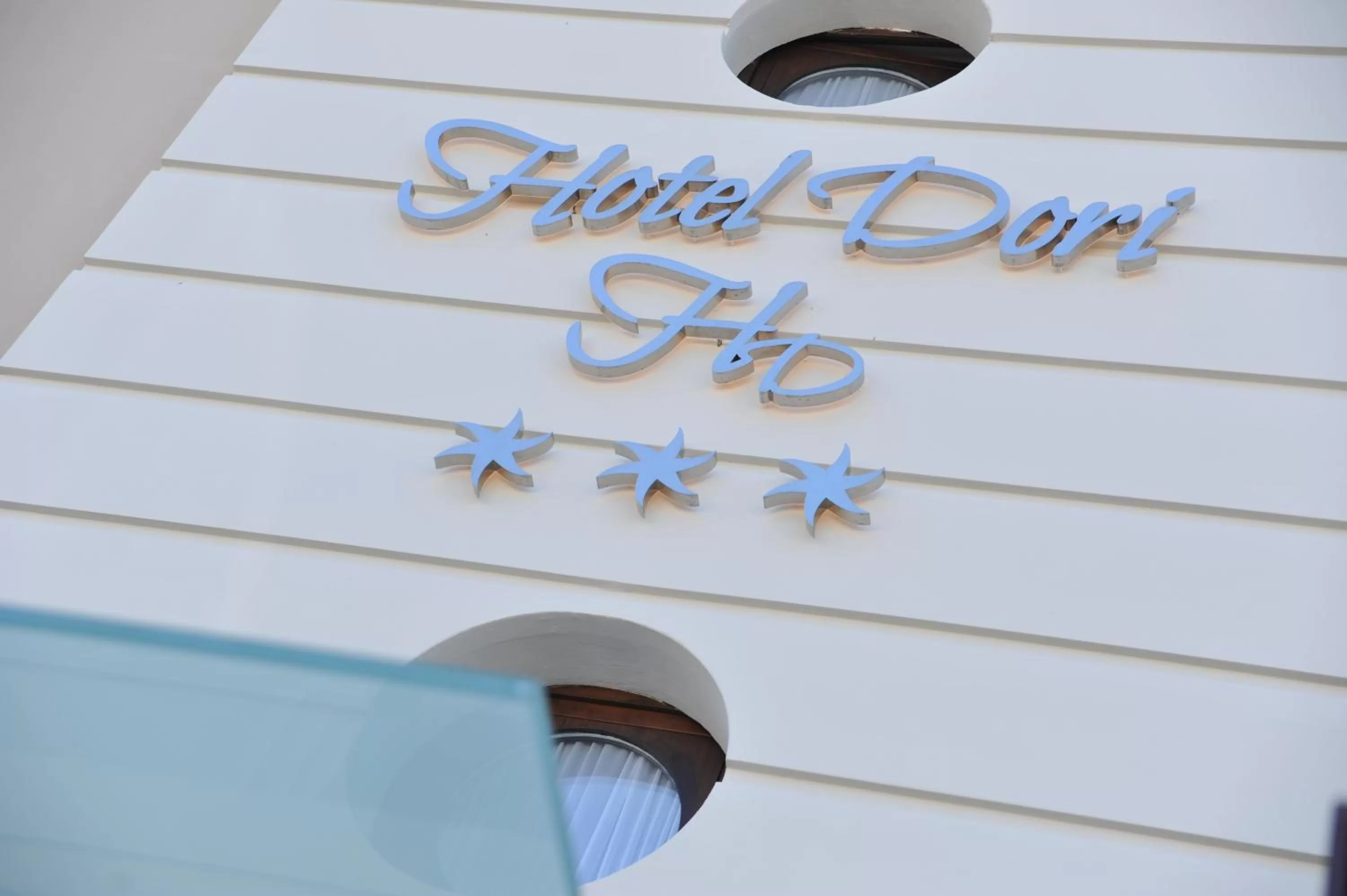 Property logo or sign in Hotel Dori