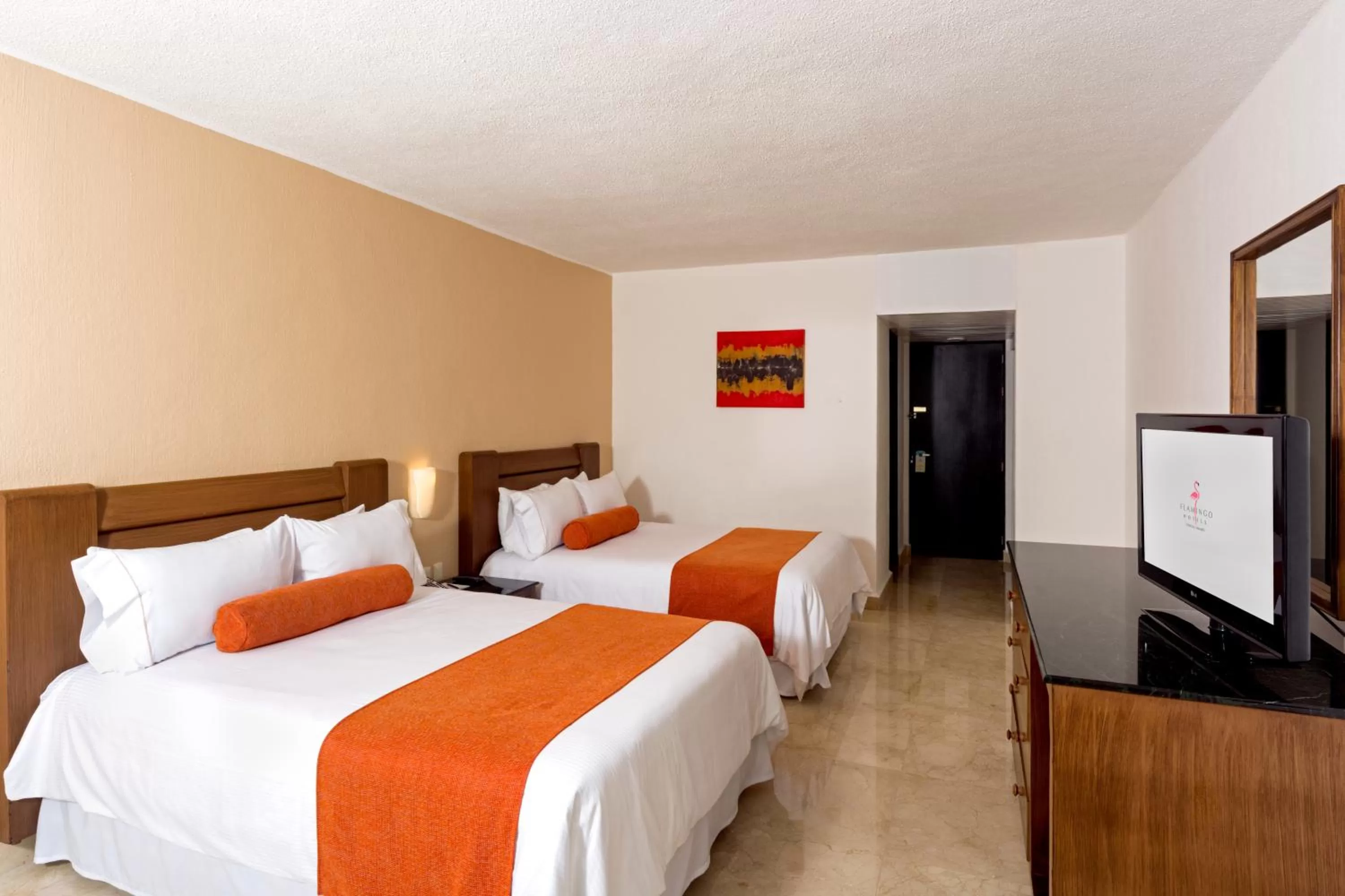 Bed in Flamingo Cancun All Inclusive