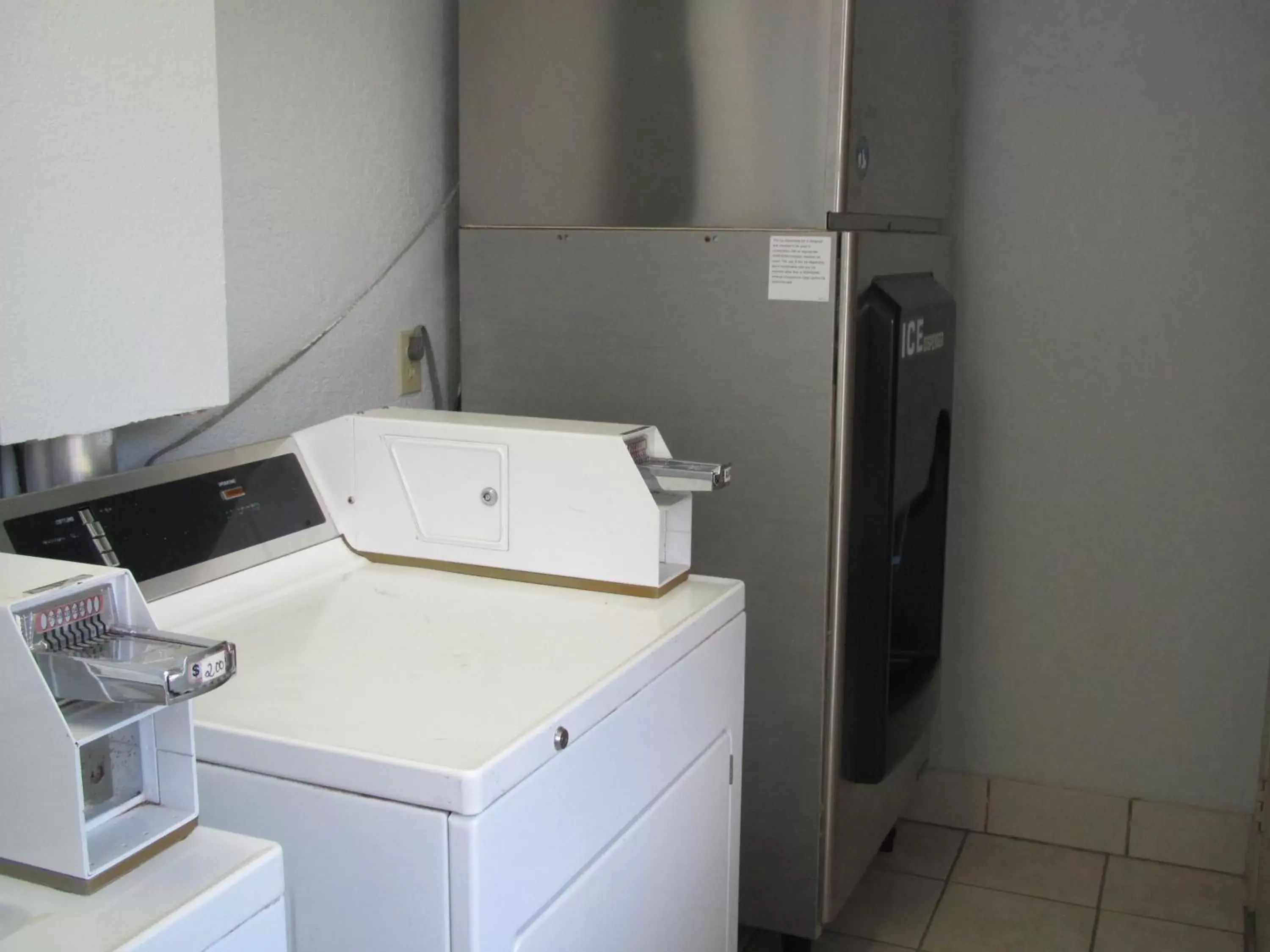 washing machine, Bathroom in Super 8 by Wyndham Dumas TX