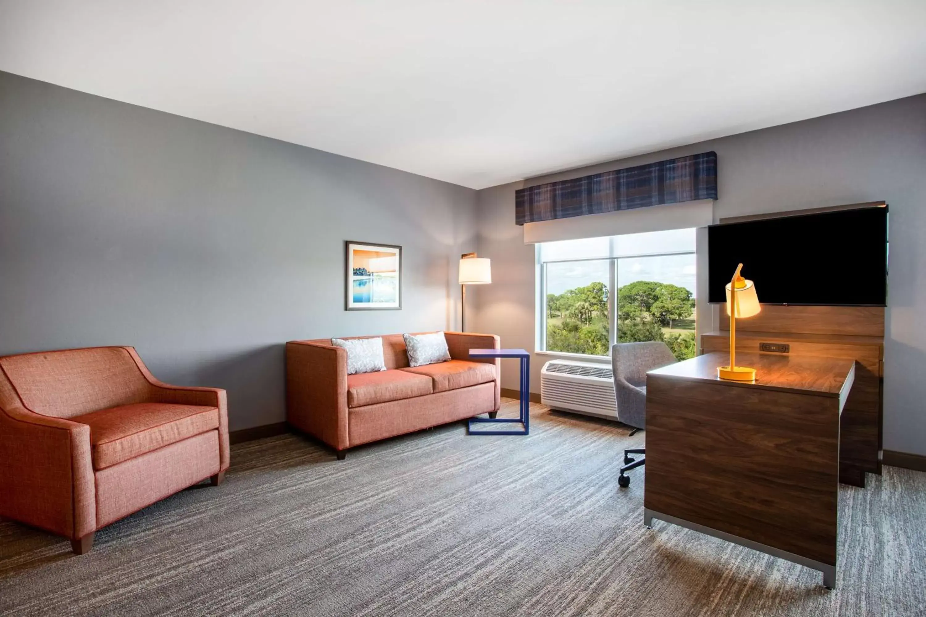 Bedroom, Seating Area in Hampton Inn & Suites North Port, Fl