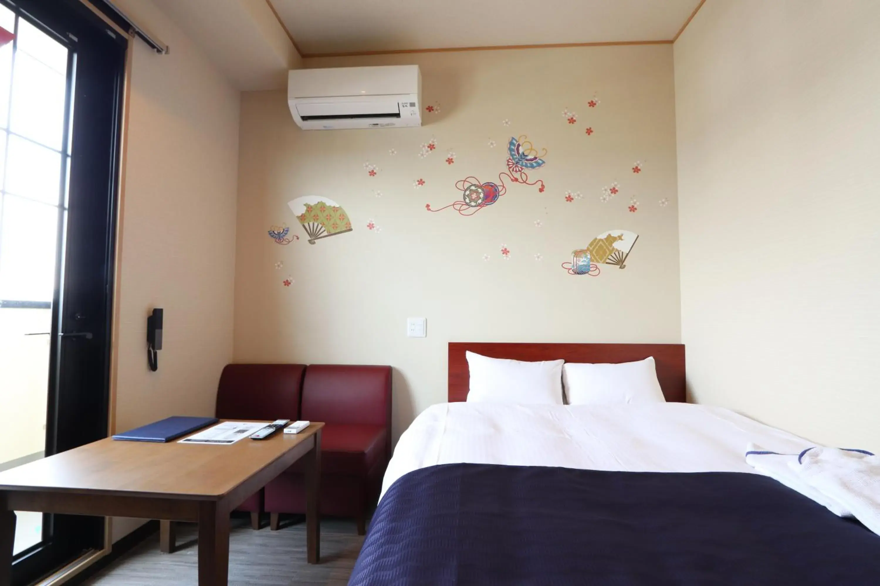 Bed in Hotel Kanade Kanku Kaizuka