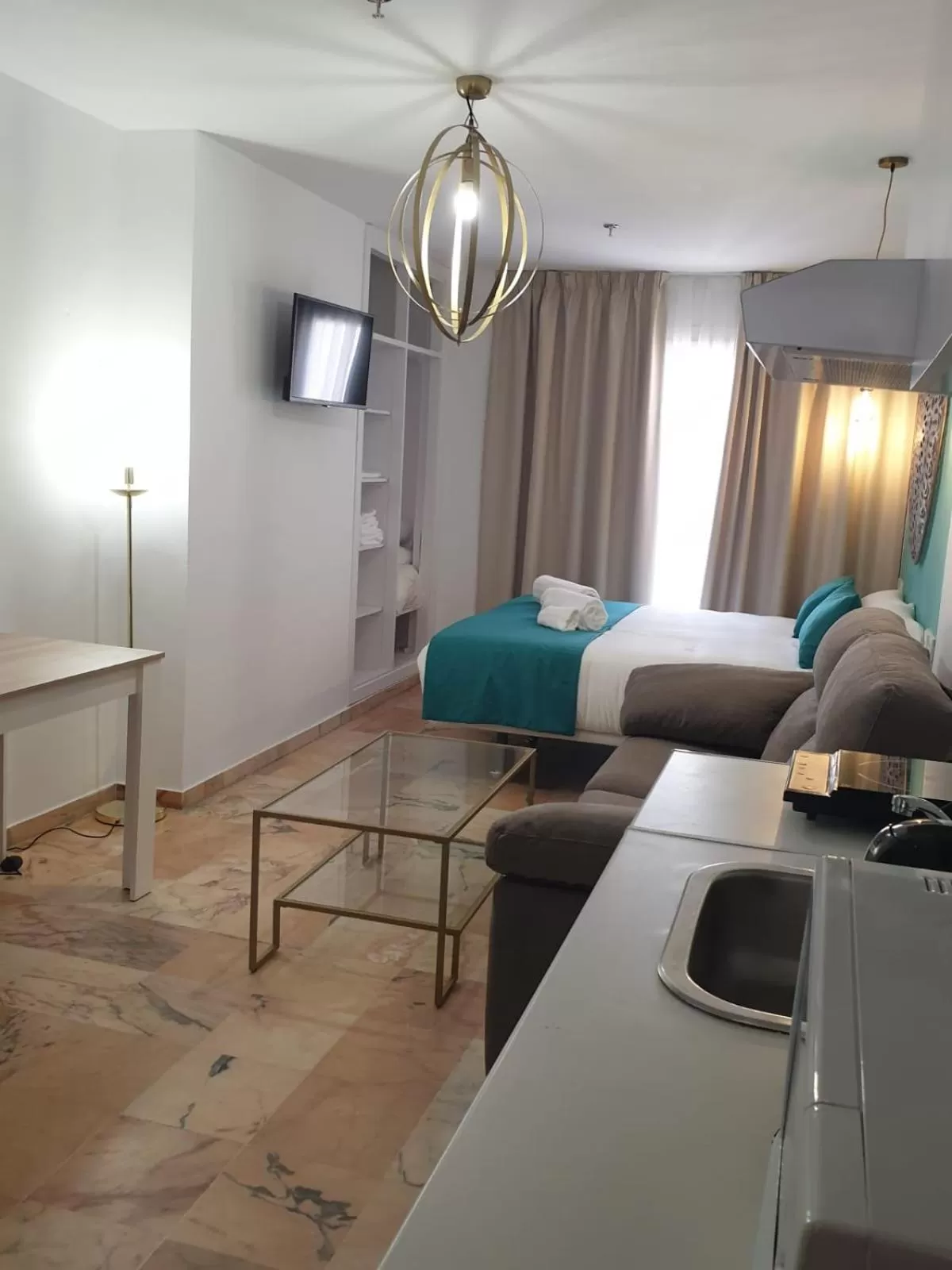 Photo of the whole room, Bed in Hotel y Apartamentos Doña Lola