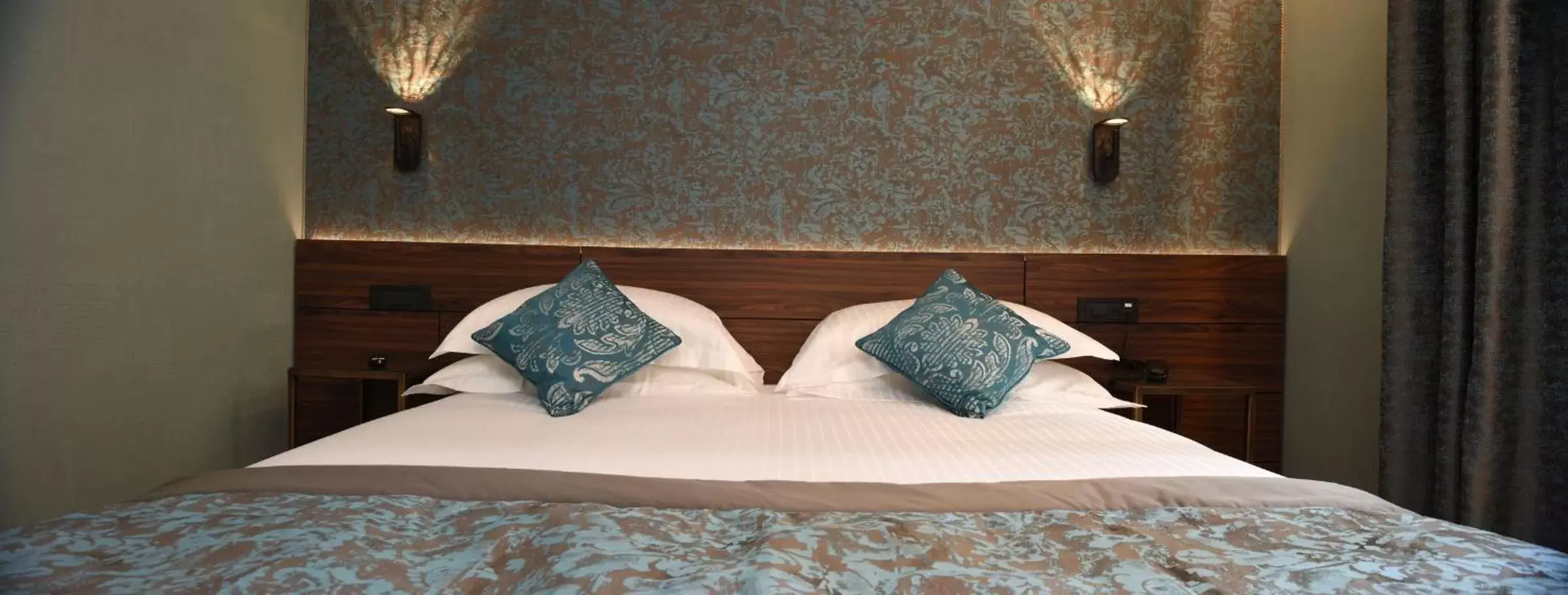 Bed in Rosa Salva Hotel