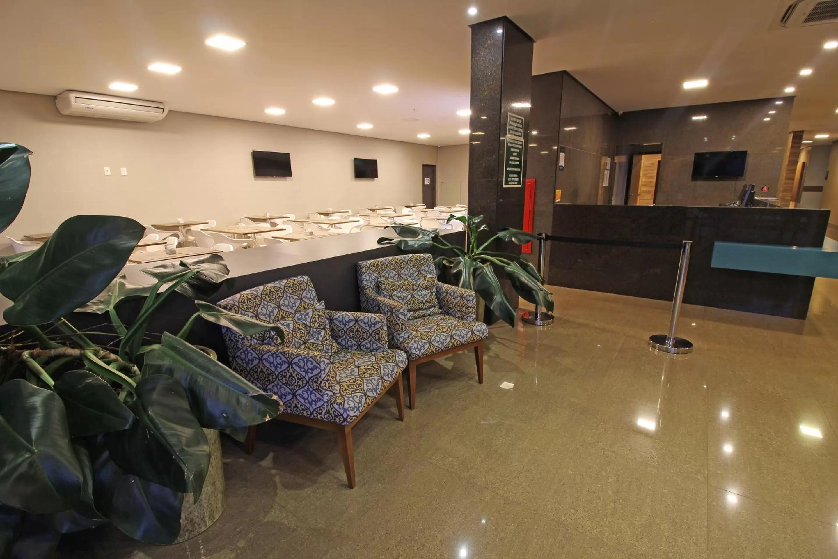 Lobby or reception in Impar Suites Barao de Cocais
