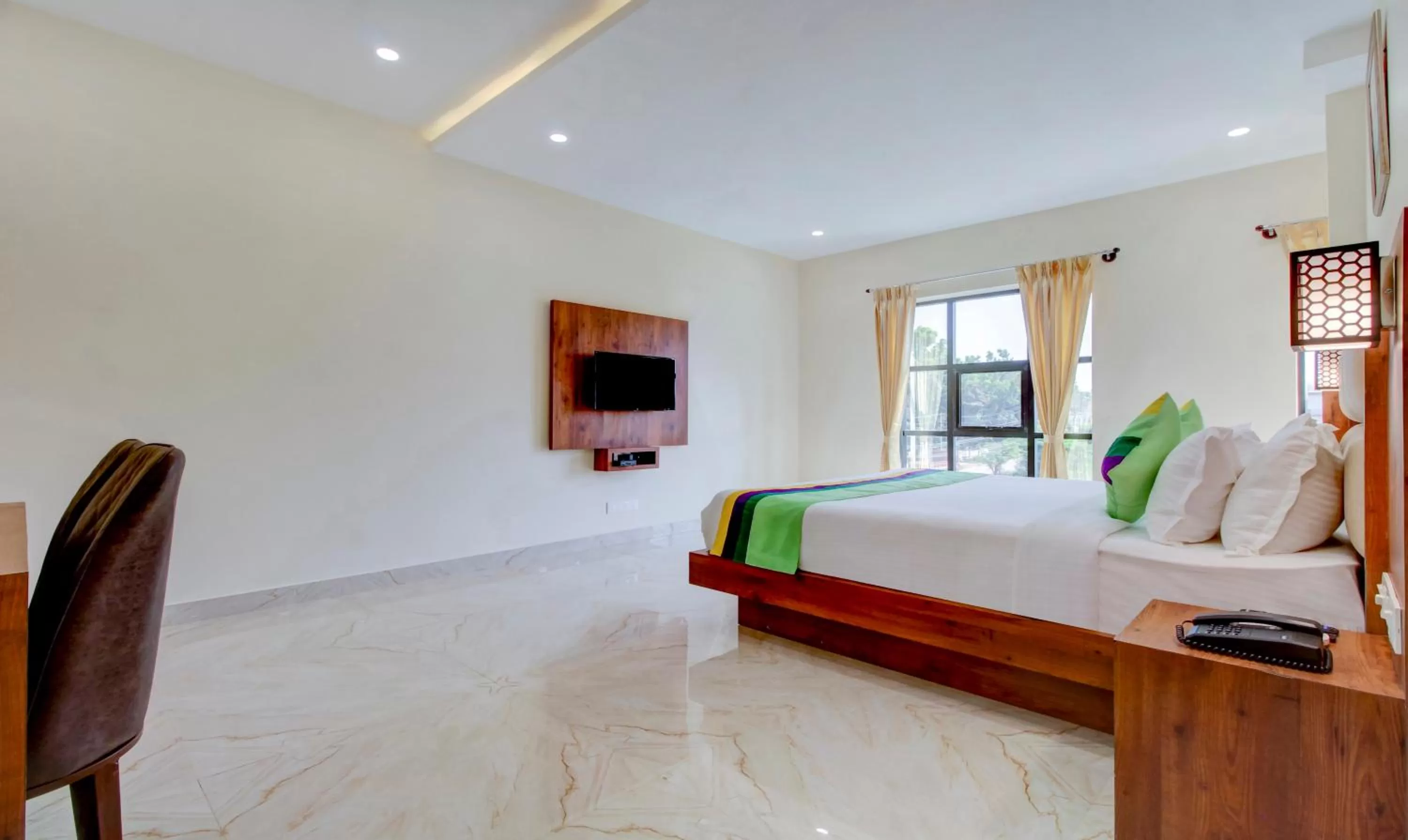 Bedroom, Bed in Treebo The Meridian