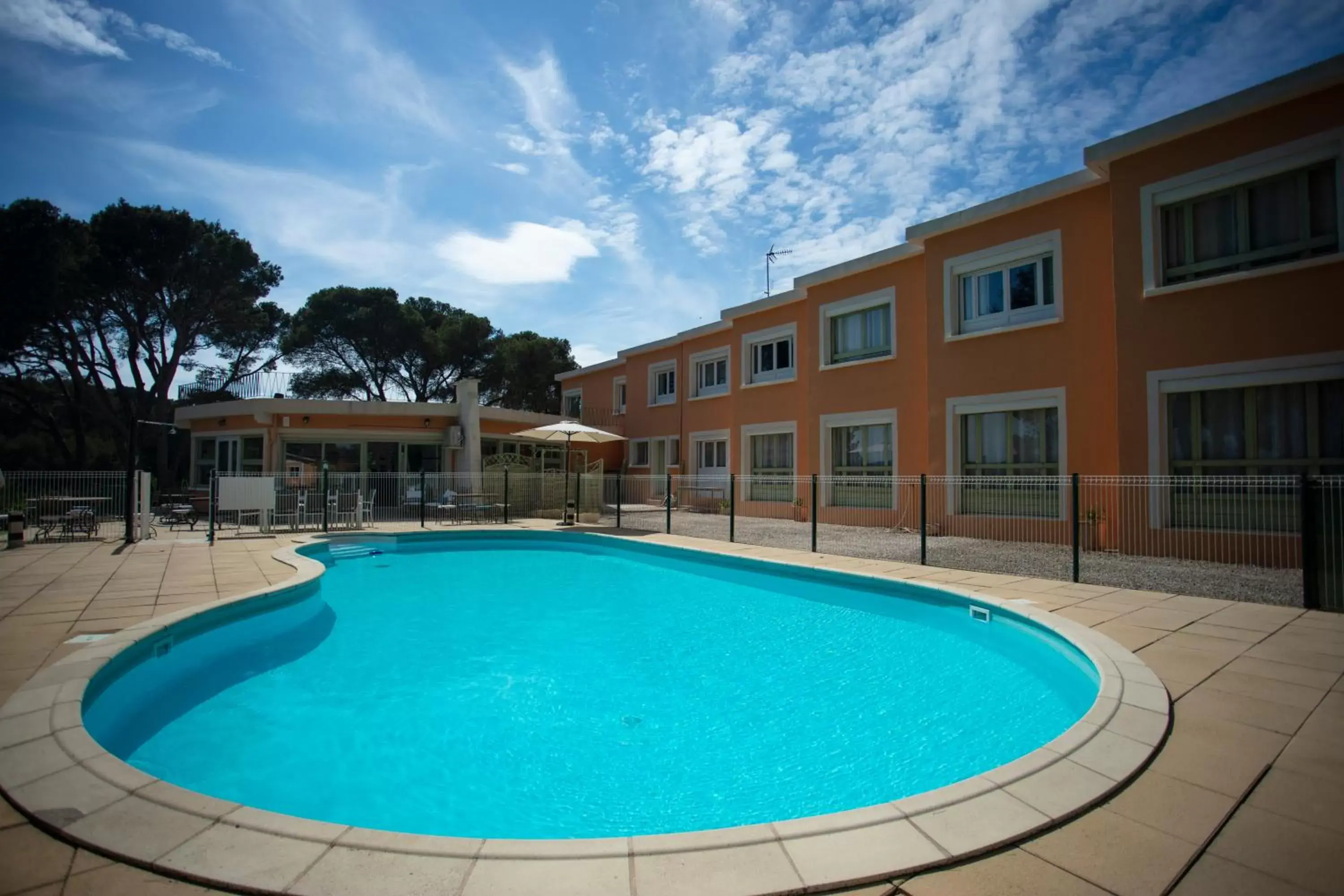 Garden, Swimming Pool in Hotel Les Rocailles