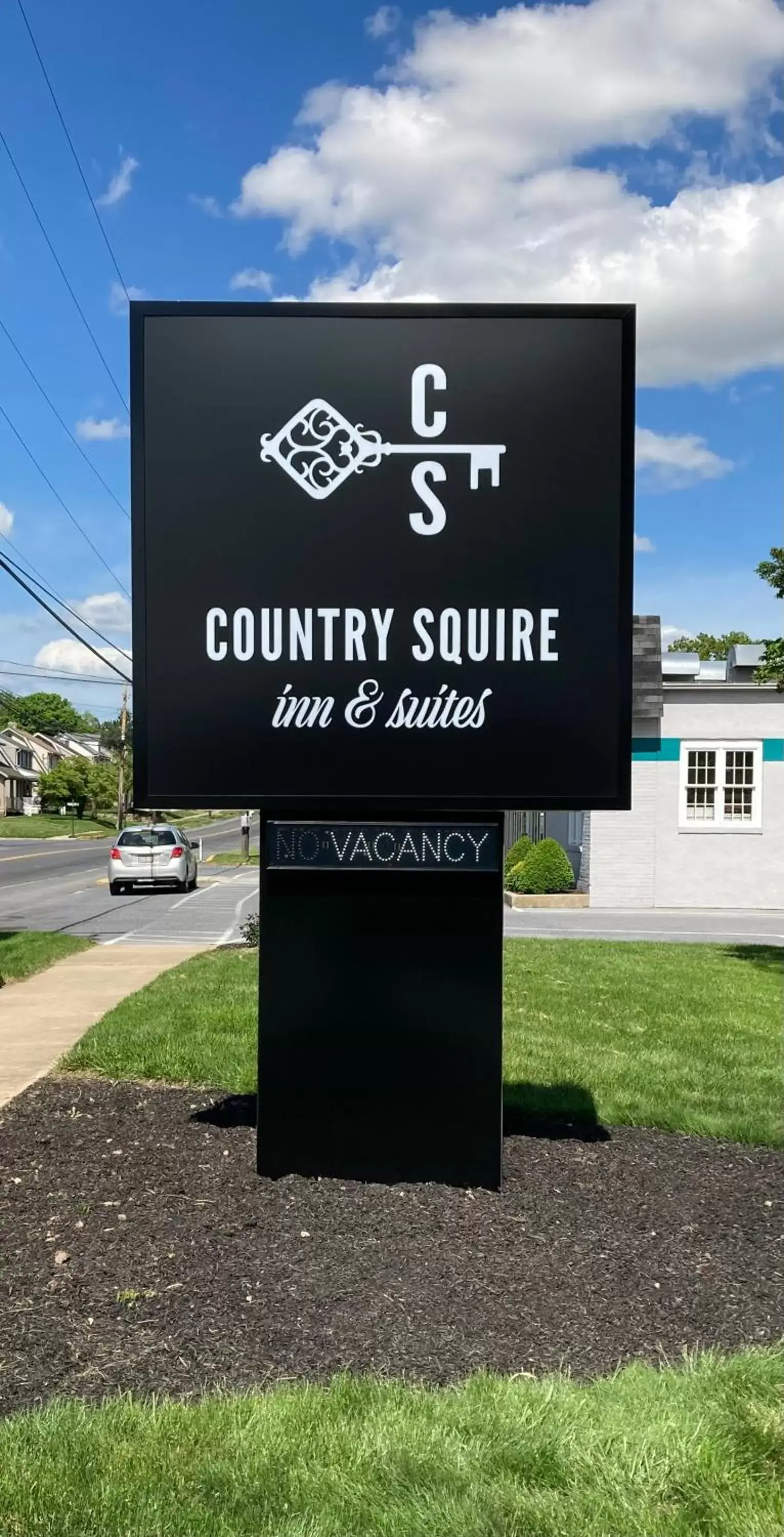 Property logo or sign, Property Logo/Sign in Country Squire Inn and Suites