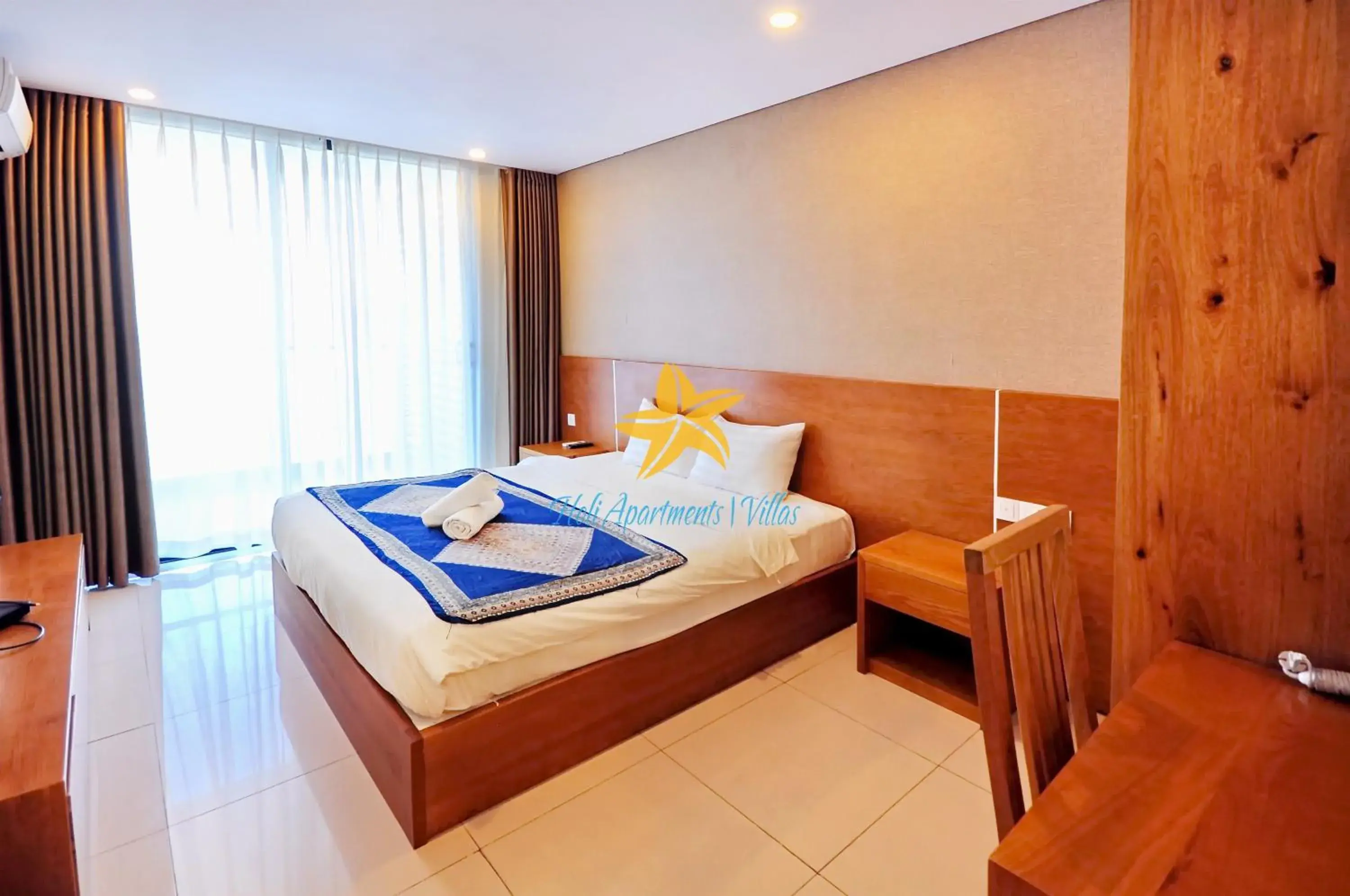 Bed in Holi Beach Hotel & Apartments