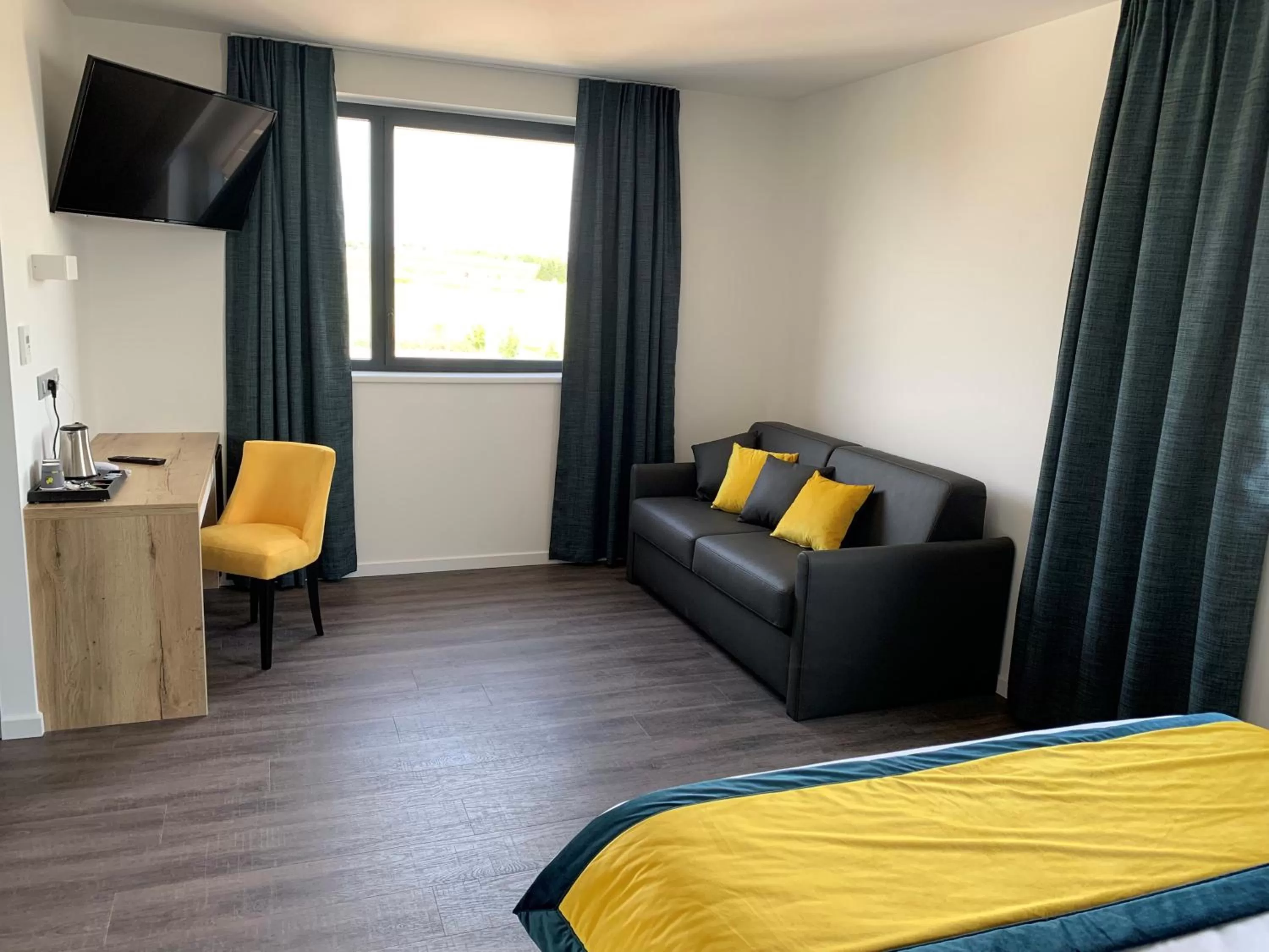 Bed in ATOLON PARK HOTEL