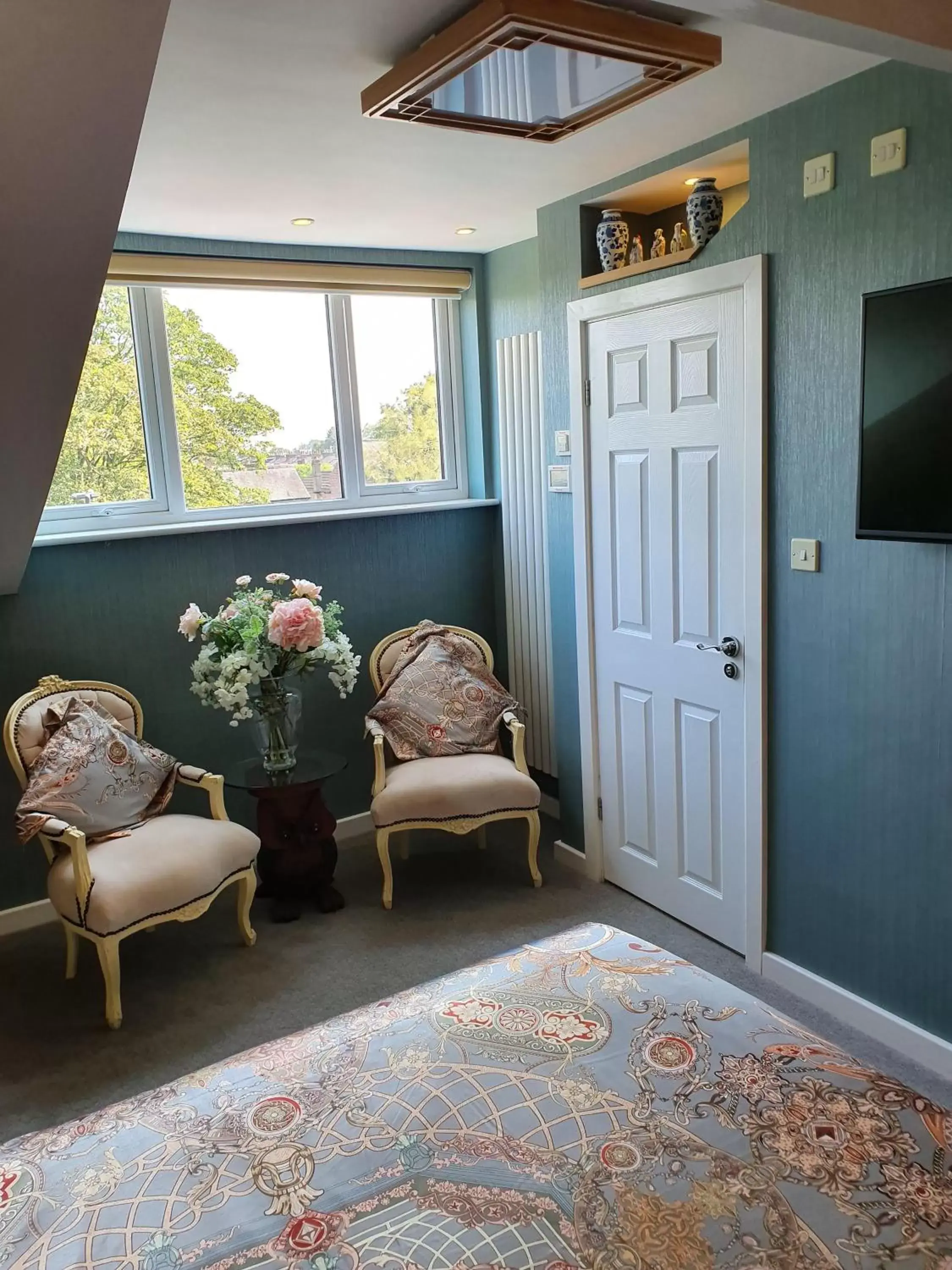 Bedroom, Seating Area in Tower Guest House