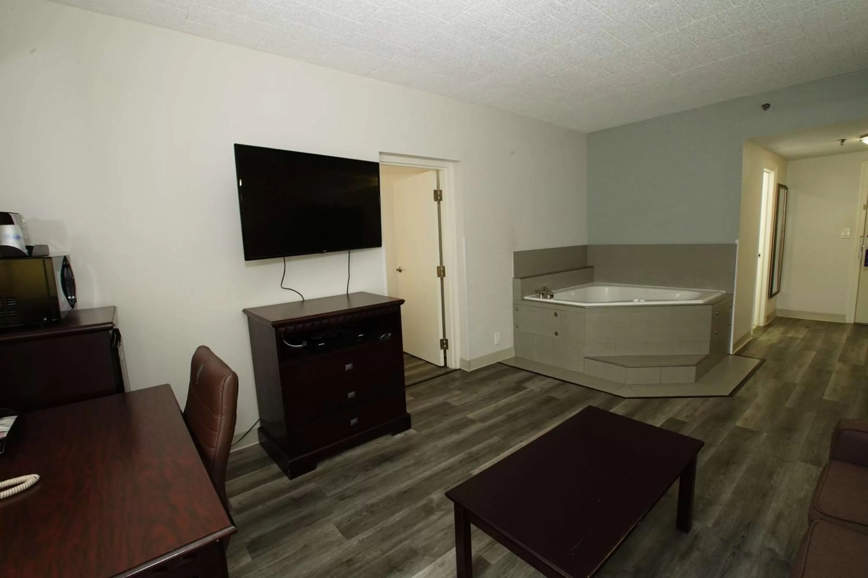 Photo of the whole room, TV/Entertainment Center in Best Western Paramus Hotel & Suites