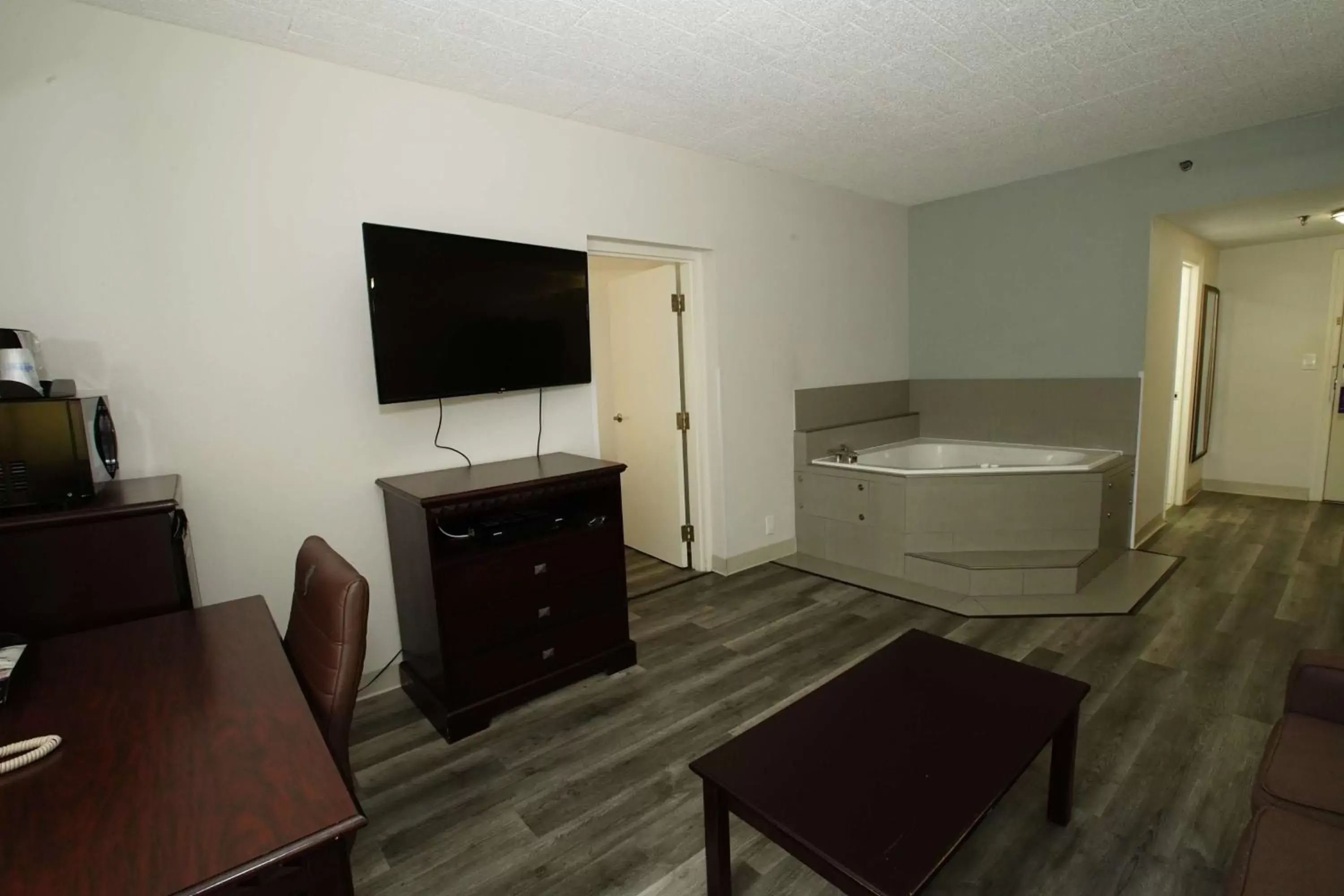 Photo of the whole room, TV/Entertainment Center in Best Western Paramus Hotel & Suites