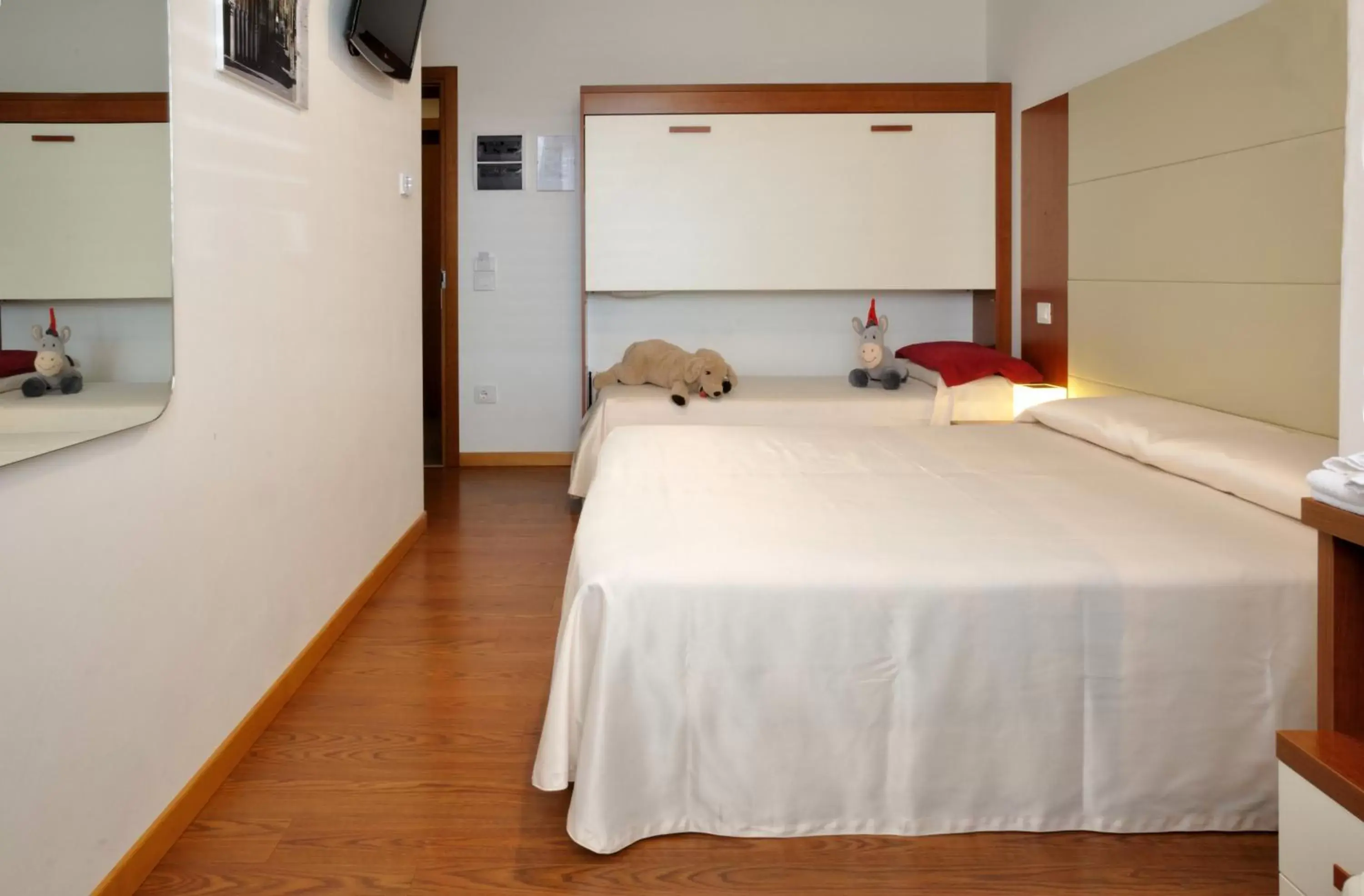 Double Room with Extra Bed in Hotel Mezzaluna