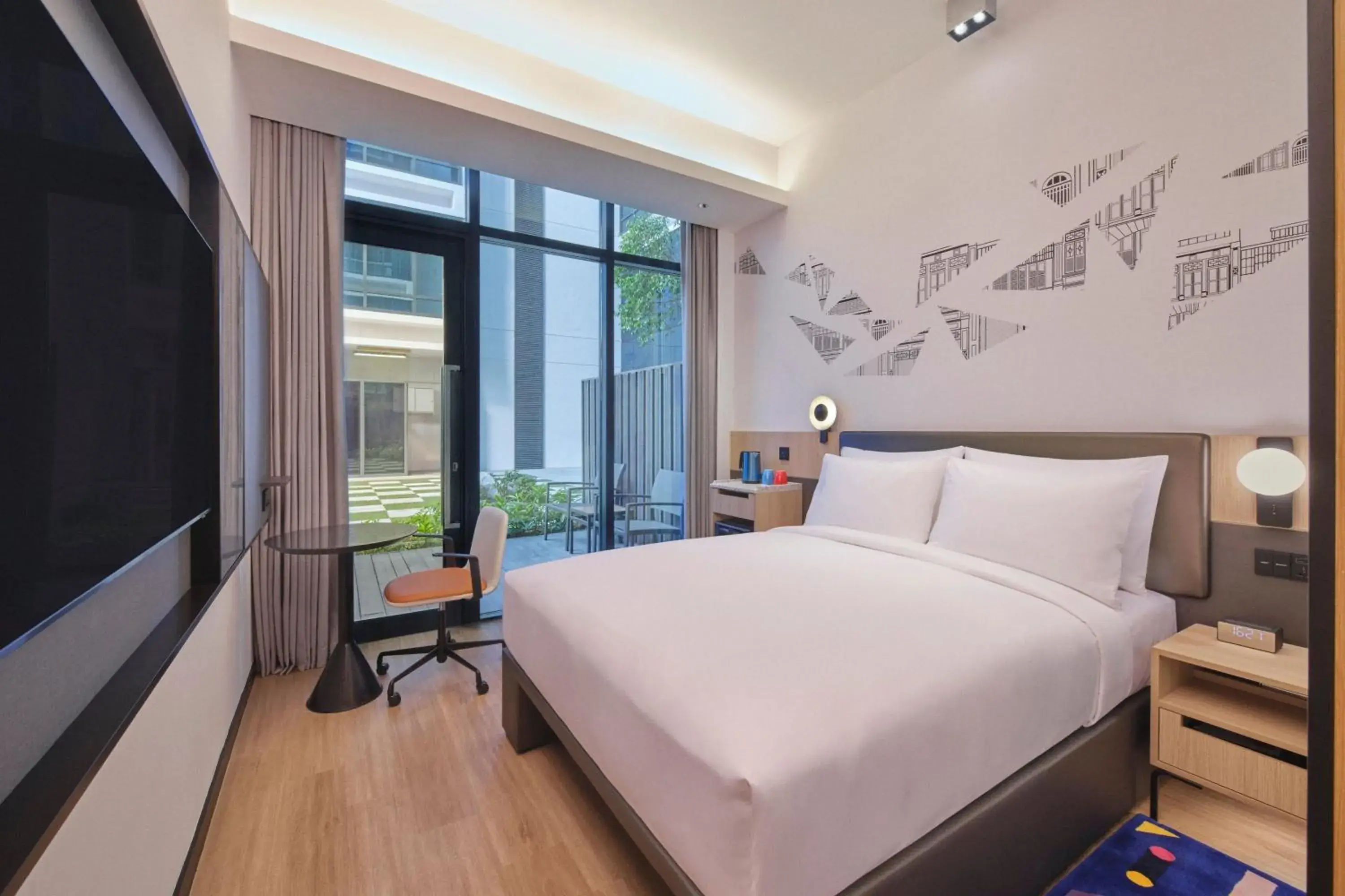 Photo of the whole room, Bed in Aloft Singapore Novena