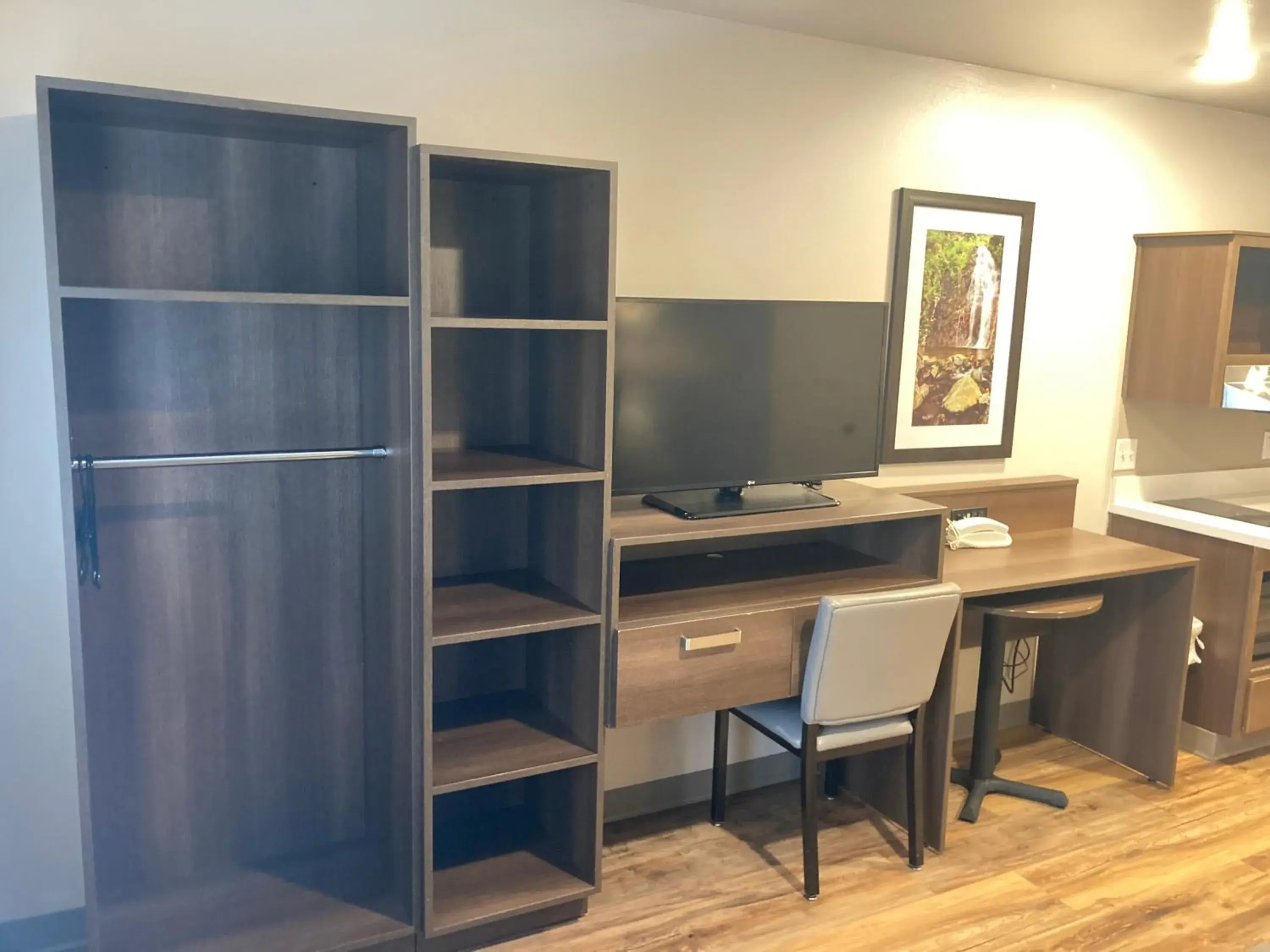 Seating area, TV/Entertainment Center in Woodspring Suites Cherry Hill