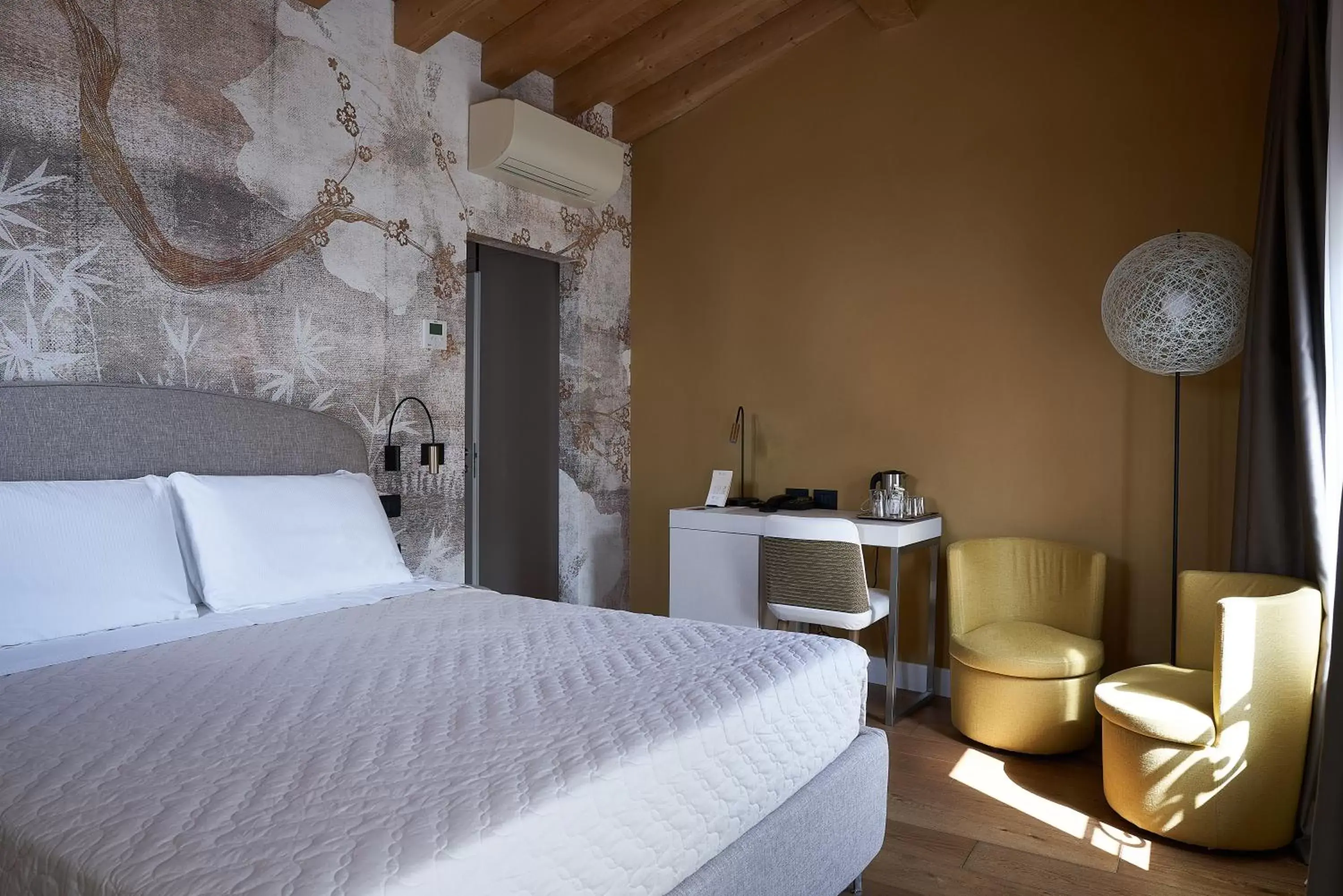 Photo of the whole room, Bed in Locanda delle Mercanzie