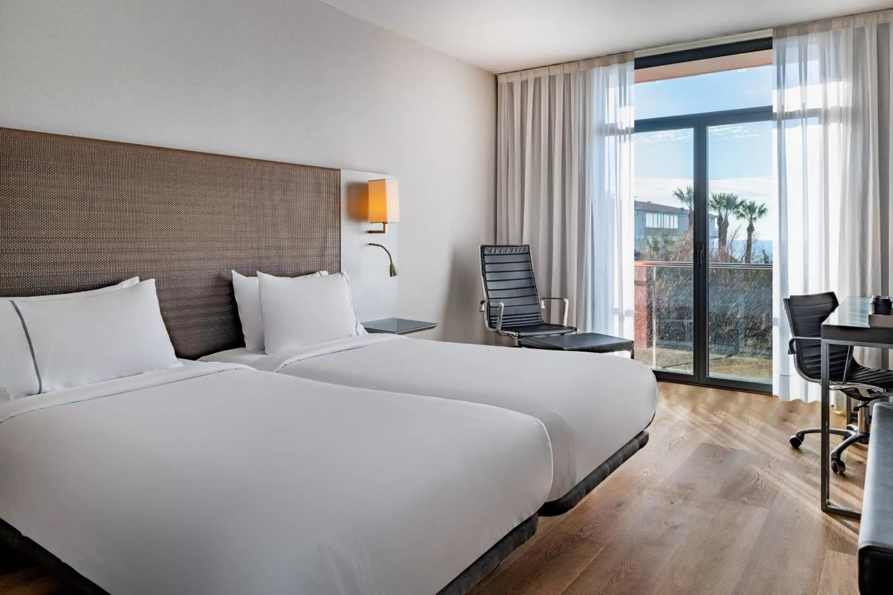 Photo of the whole room, Bed in AC Hotel Gavà Mar Airport by Marriott