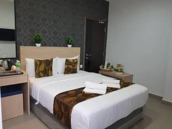 Bed in D'Metro Hotel