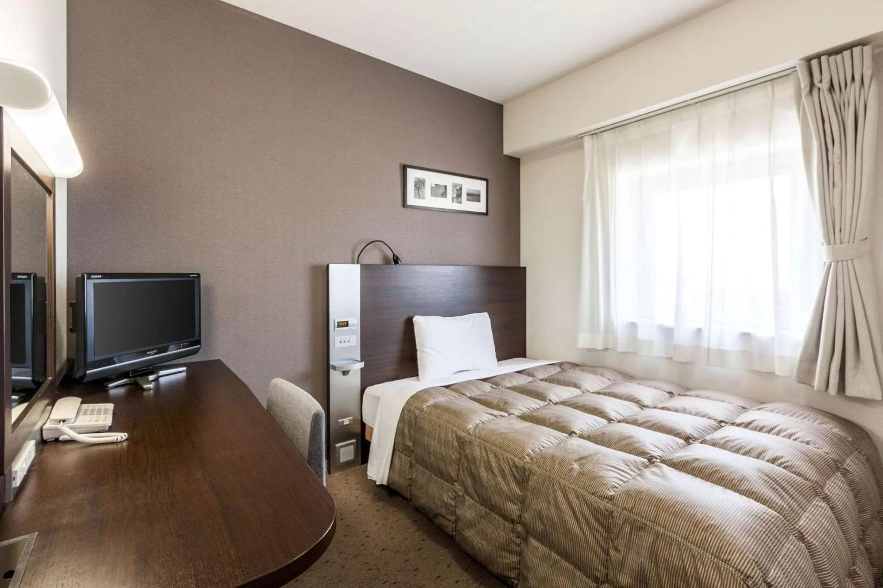 Photo of the whole room, Bed in Comfort Hotel Obihiro