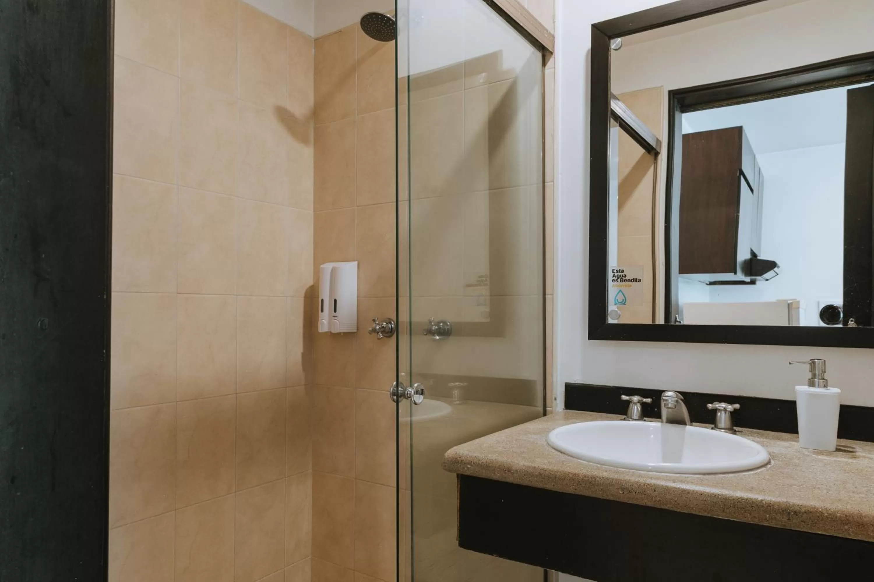 Bathroom in Travelers Orange Suites