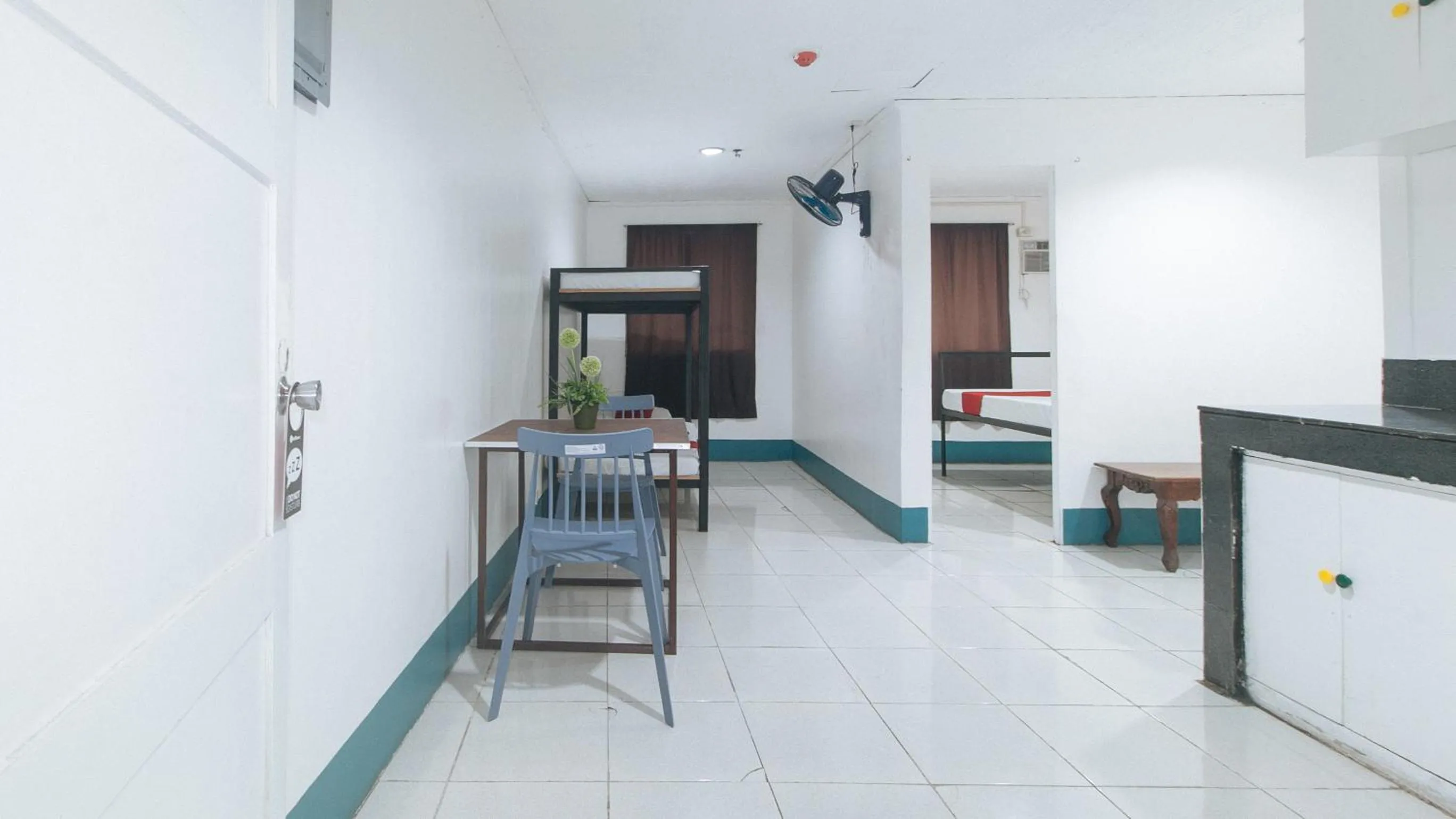 Seating area in RedDoorz at Crowne One Condo