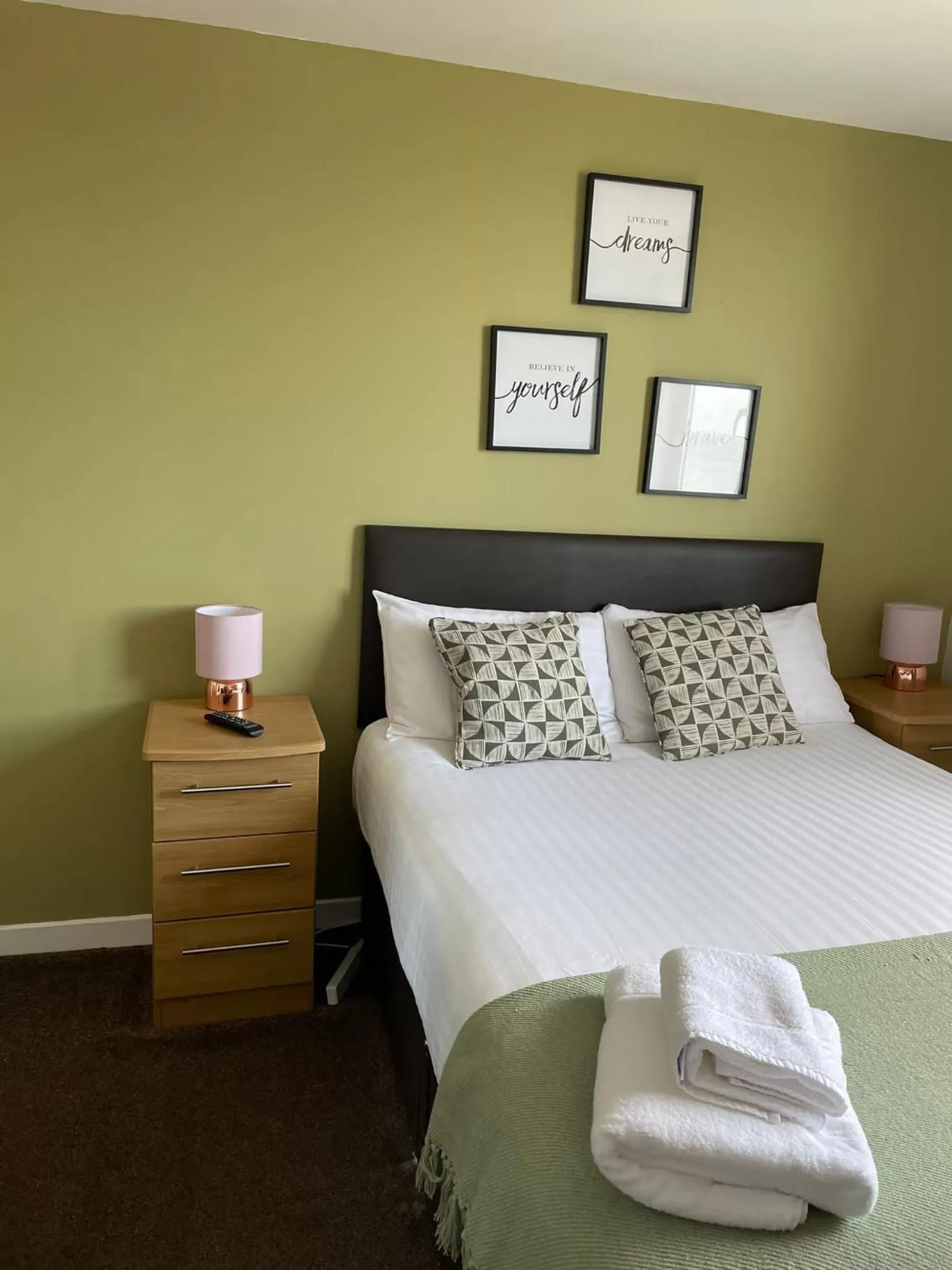 Bed in The Davron Hotel