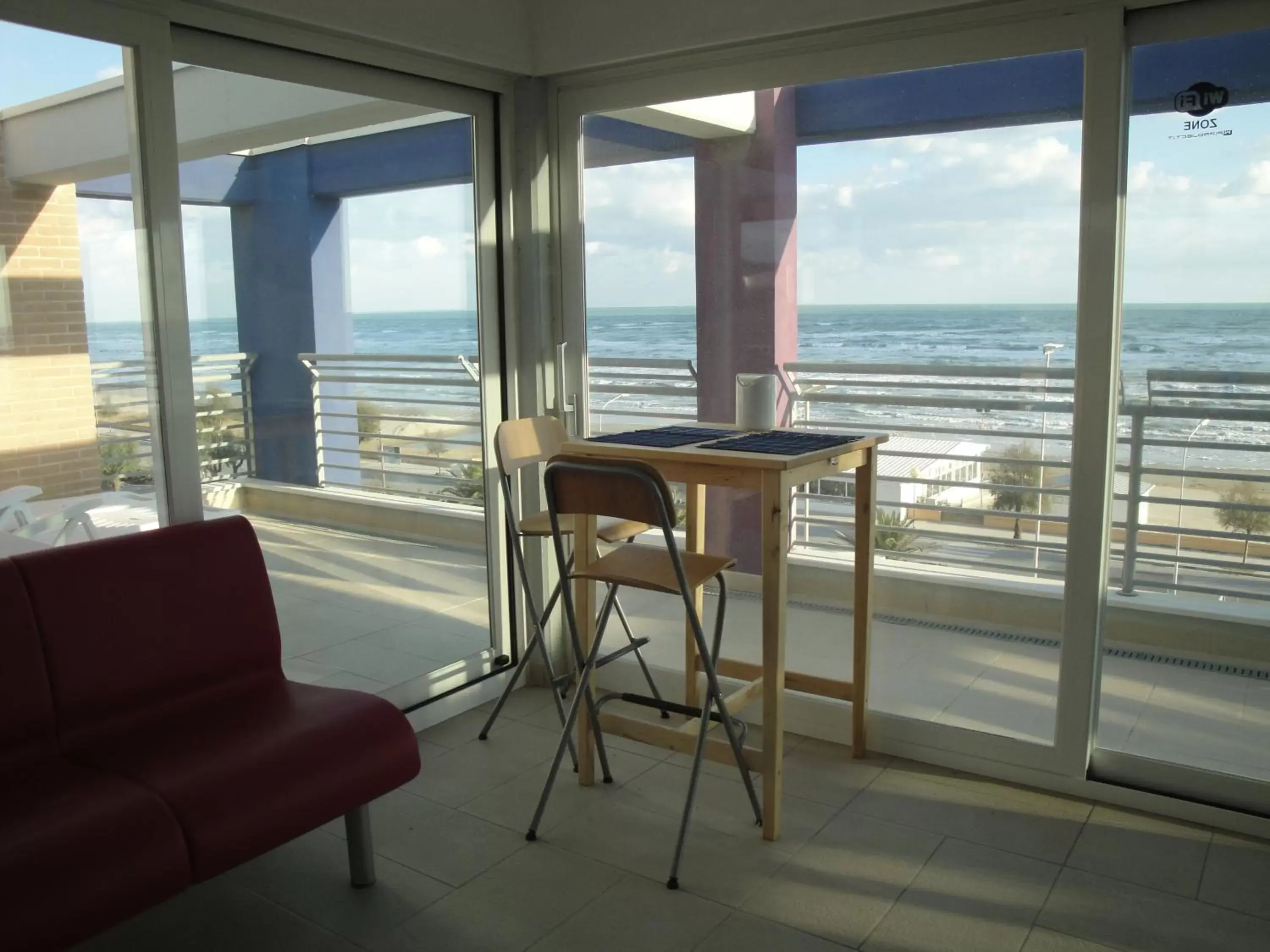 Communal lounge/ TV room, Sea View in Residence La Nave