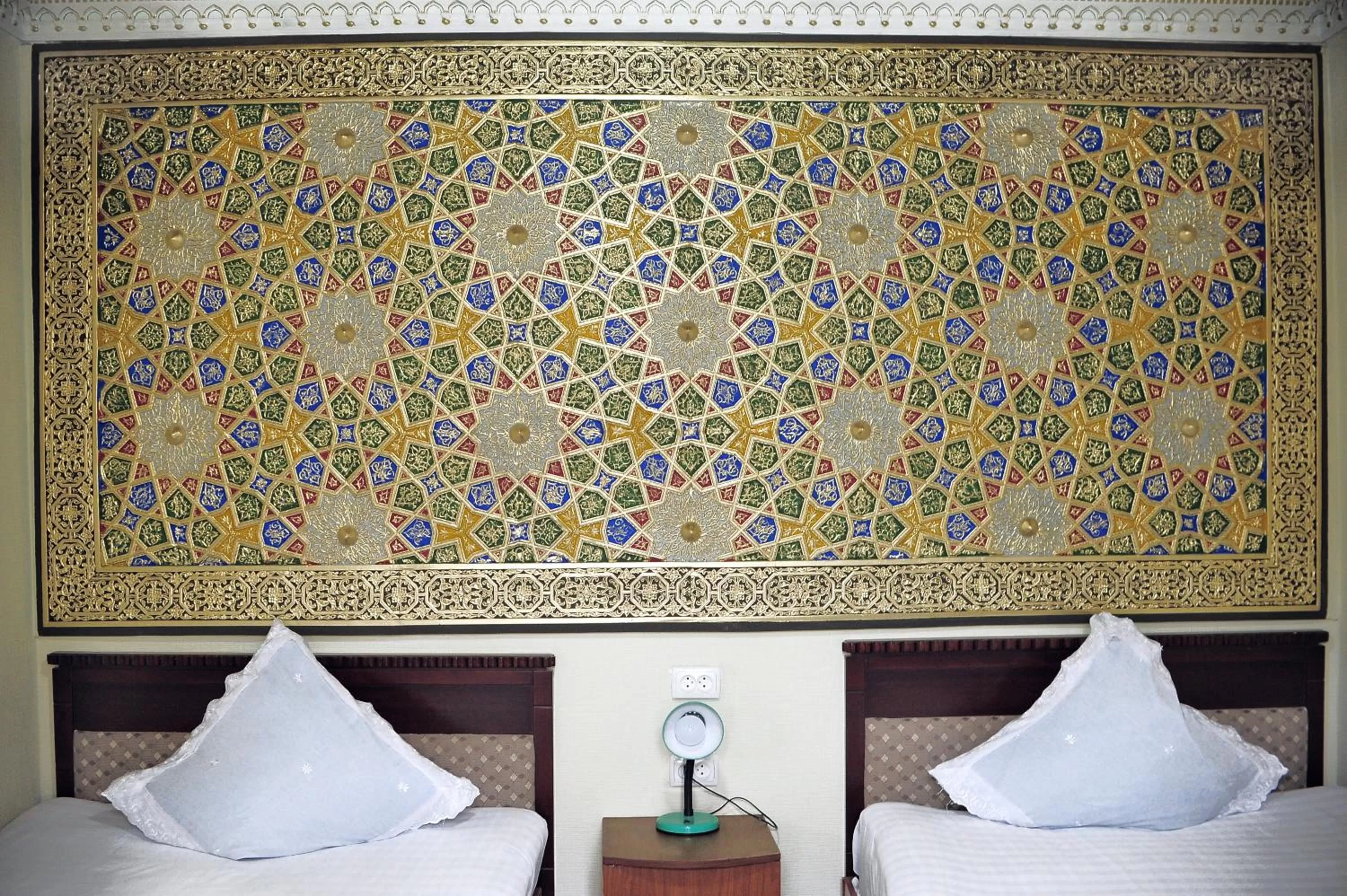 Bed in Sukhrob Barzu Hotel