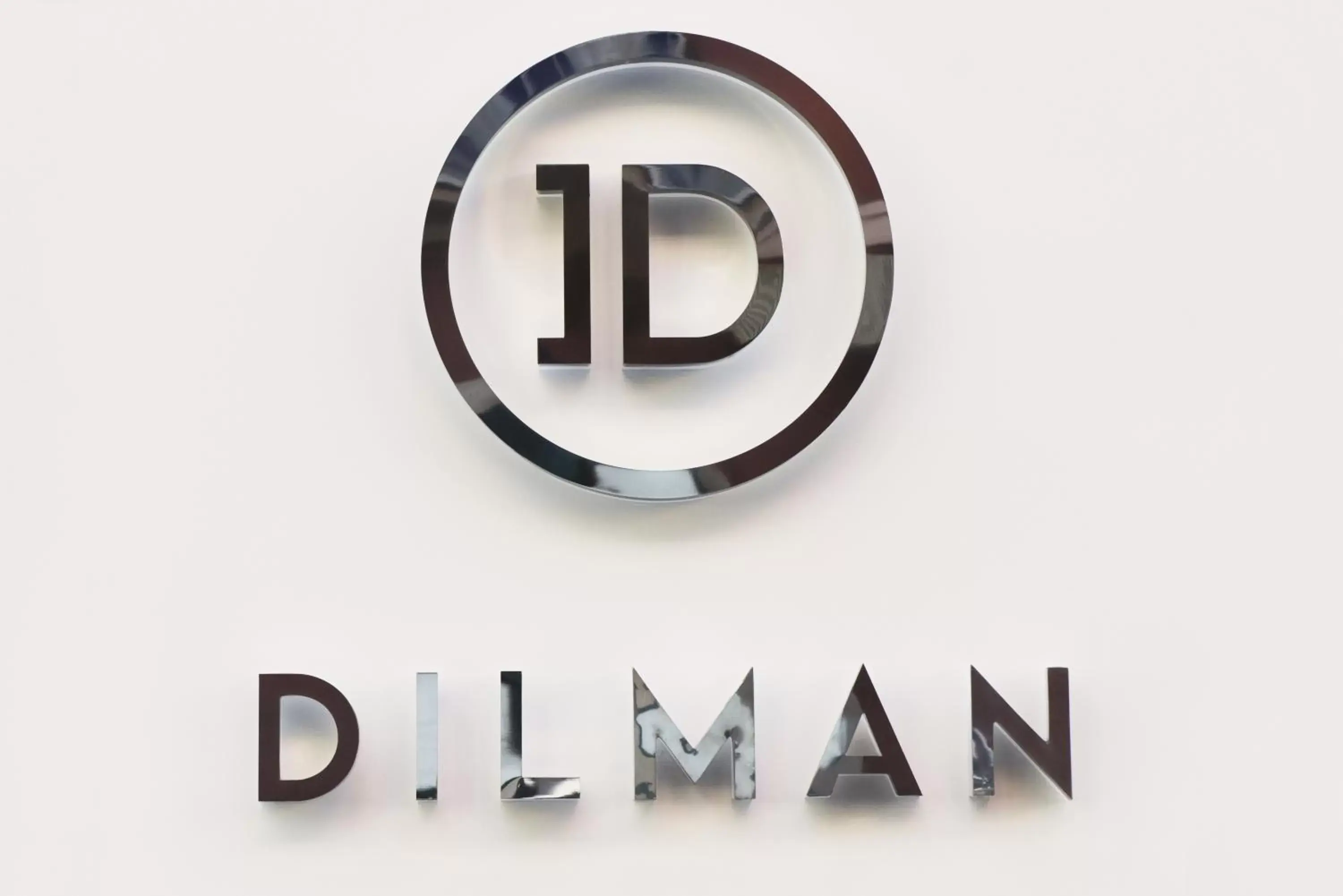 Property Logo/Sign in Dilman Luxury Stay